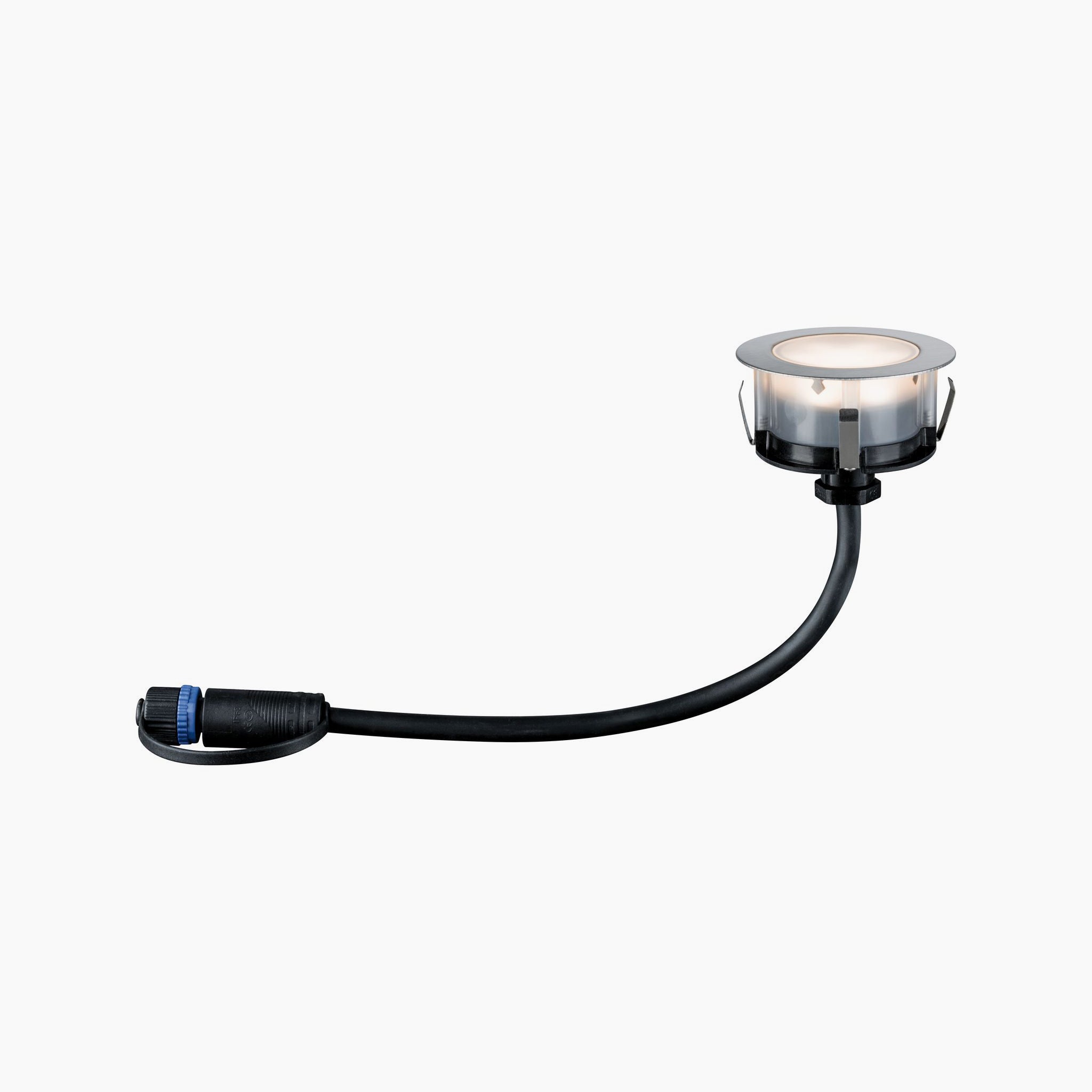 The Paulmann - Plug & Shine Outdoor 2W LED Recessed Floor Individual Eco Spotlight in Silver is a compact lighting solution featuring a black flexible cable and plug, perfect for illuminating outdoor spaces. Its water jet protection ensures durability and reliable performance in various weather conditions.