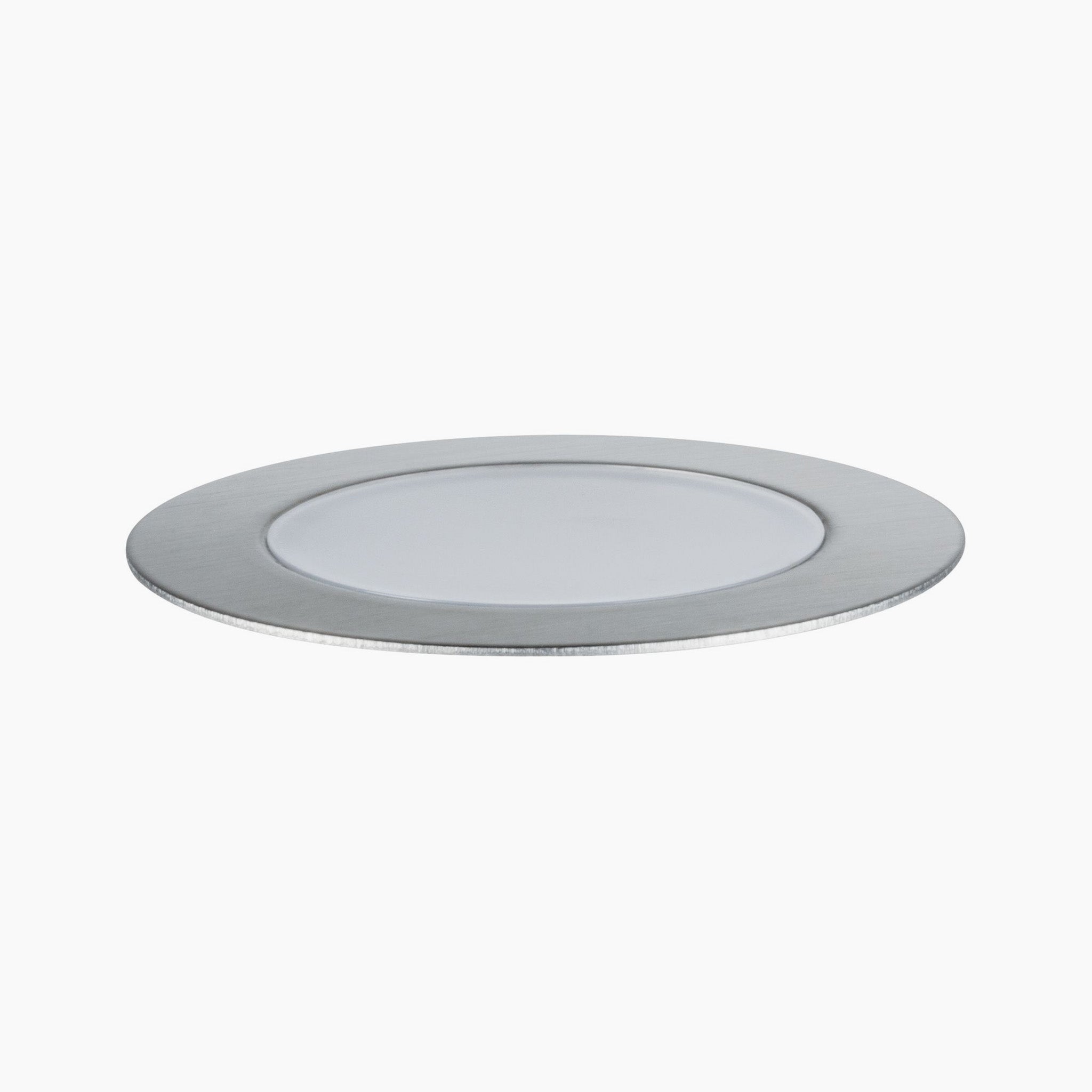 The Paulmann - Plug & Shine Outdoor 2W LED Recessed Floor Individual Eco Spotlight in silver rests elegantly on a plain white background, reminiscent of a round, flat plate.