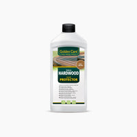The Golden Care Hardwood Protector, packaged in a white bottle with a black cap, offers premium protection for teak furniture. This product maintains optimal care by preserving the natural beauty of your outdoor pieces.