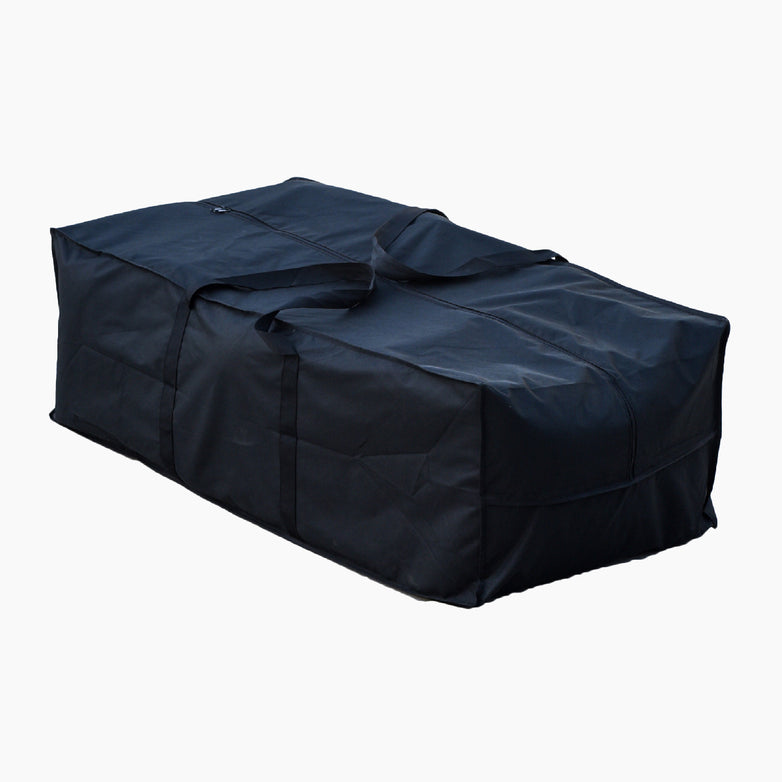 A small black rectangular cushion storage bag made from heavy-duty materials, featuring short carrying handles on a white background.