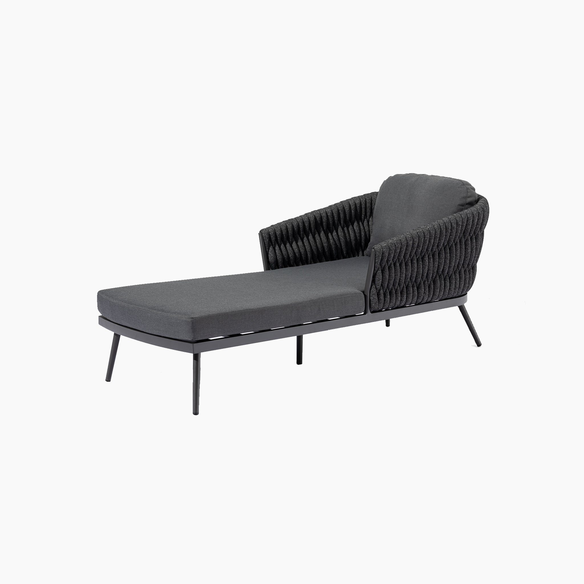 A modern grey chaise lounge with curved, woven backrest and black metal legs on a white background.