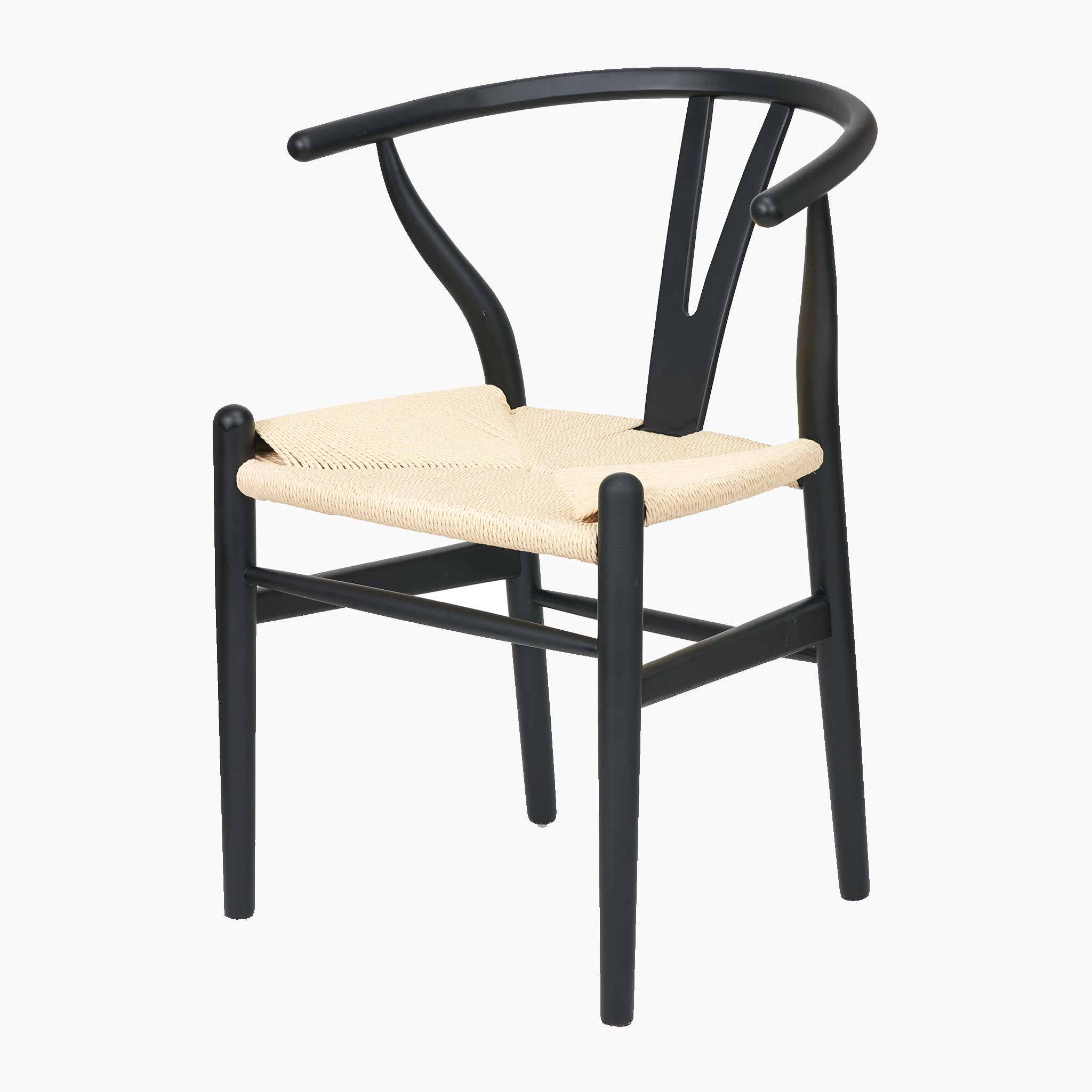 The Pacific Lifestyle - Quinn Dining Chair combines a modern black beech wood frame with a natural woven rope seat and elegantly curved backrest.