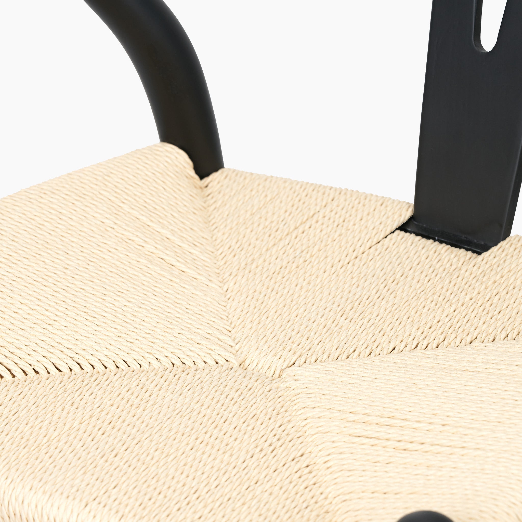 Check out the Pacific Lifestyle - Quinn Dining Chair, which showcases a beautifully woven natural rope seat, elegantly paired with a sleek black beech wood frame.