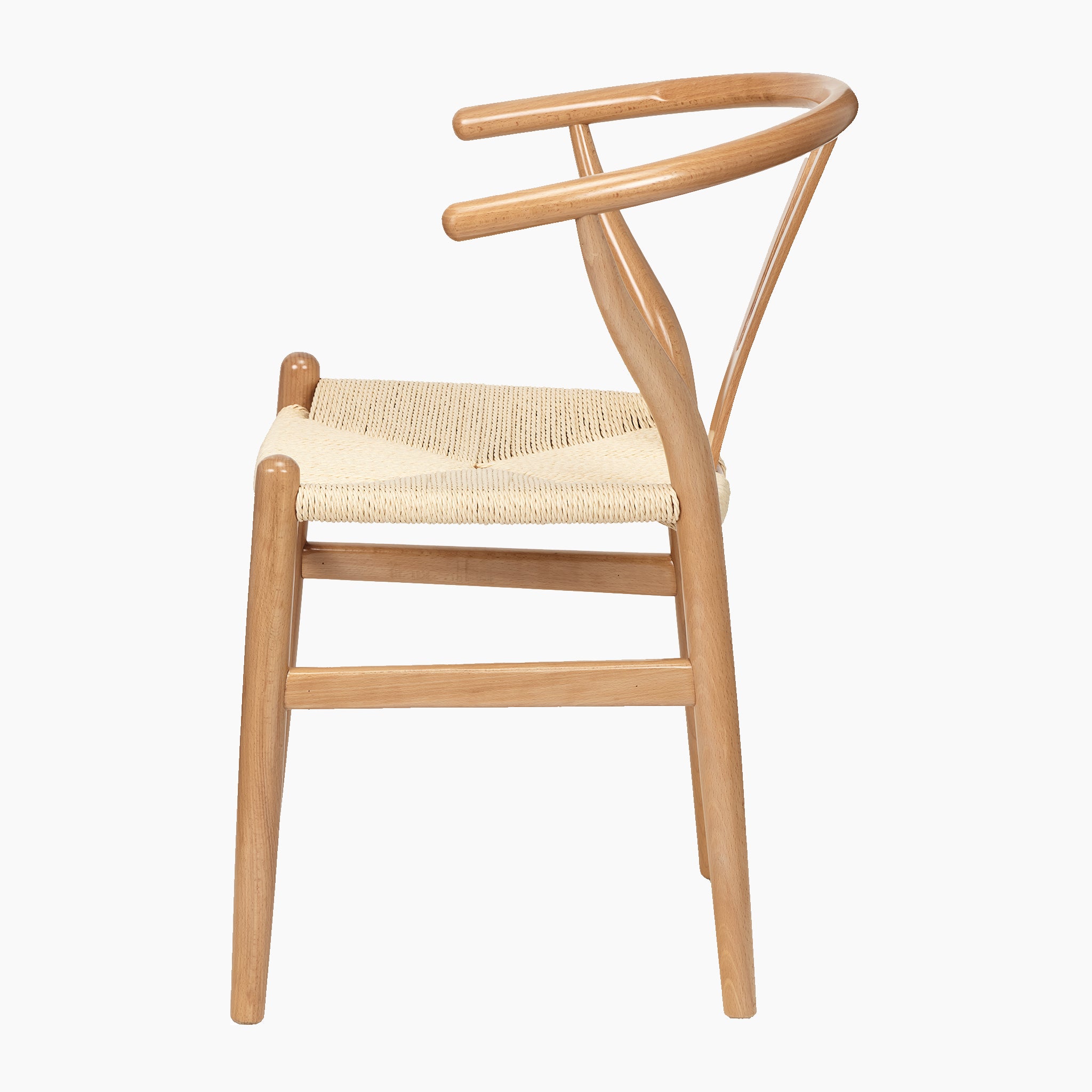 Side view of the Pacific Lifestyle Quinn Dining Chair, showcasing a natural beech wood frame and woven rope seat, with an elegantly curved backrest on a white background.