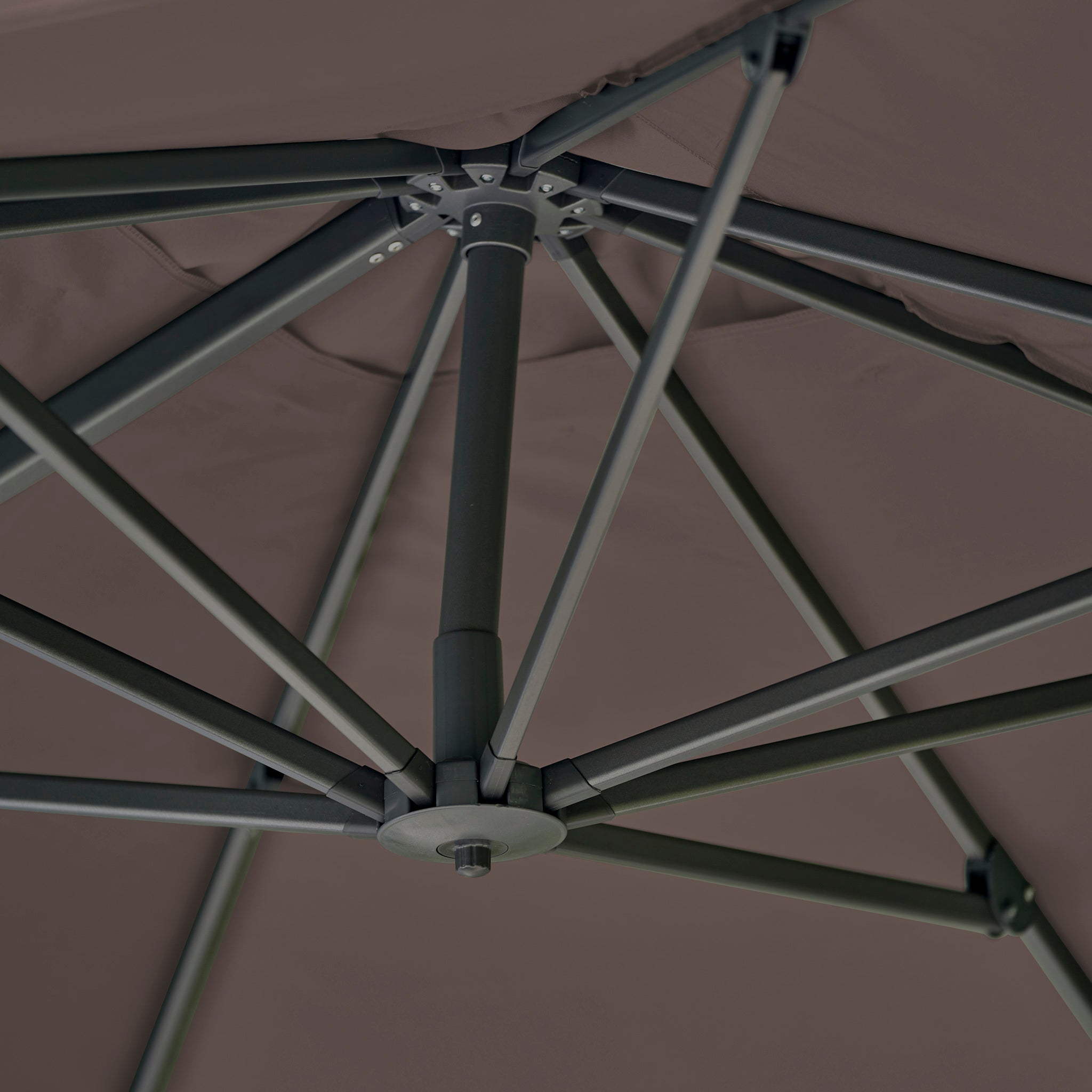 Close-up of the sturdy metal frame and supports beneath the Challenger T2 Premium 3.5m x 2.6m Rectangular Cantilever Parasol in Deep Taupe, delivering strong outdoor shade for your patio.