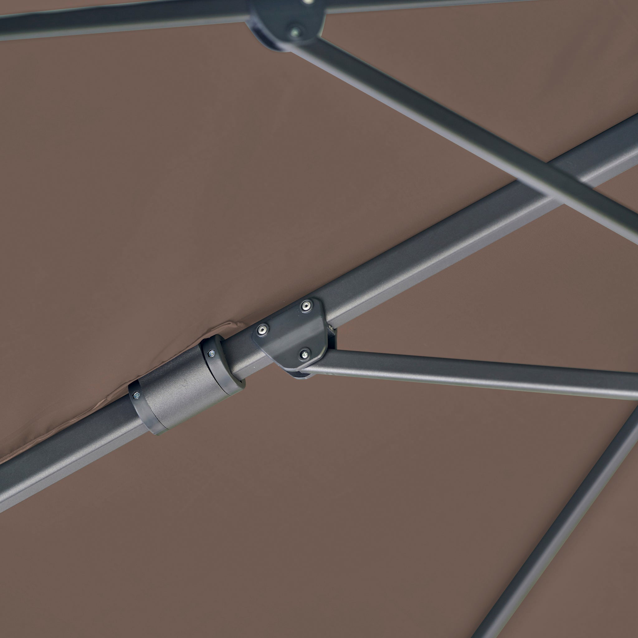 Close-up of the sturdy metal frame and joints of the Challenger T2 Premium 3.5m x 2.6m Rectangular Cantilever Parasol in Deep Taupe, highlighting its reliable construction for outdoor shade.