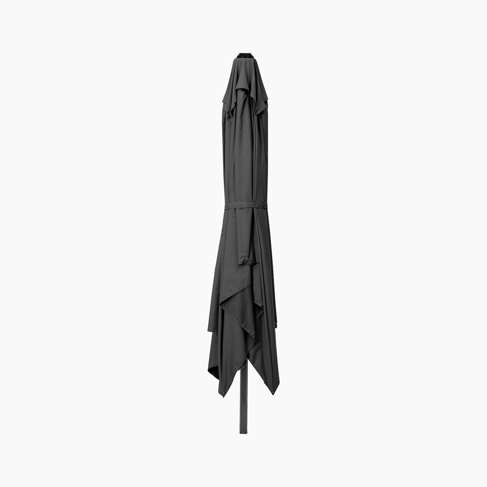 Pacific Lifestyle Voyager T2 2.7m square cantilever parasol in anthracite with a 90kg granite base stands upright against a plain white background.