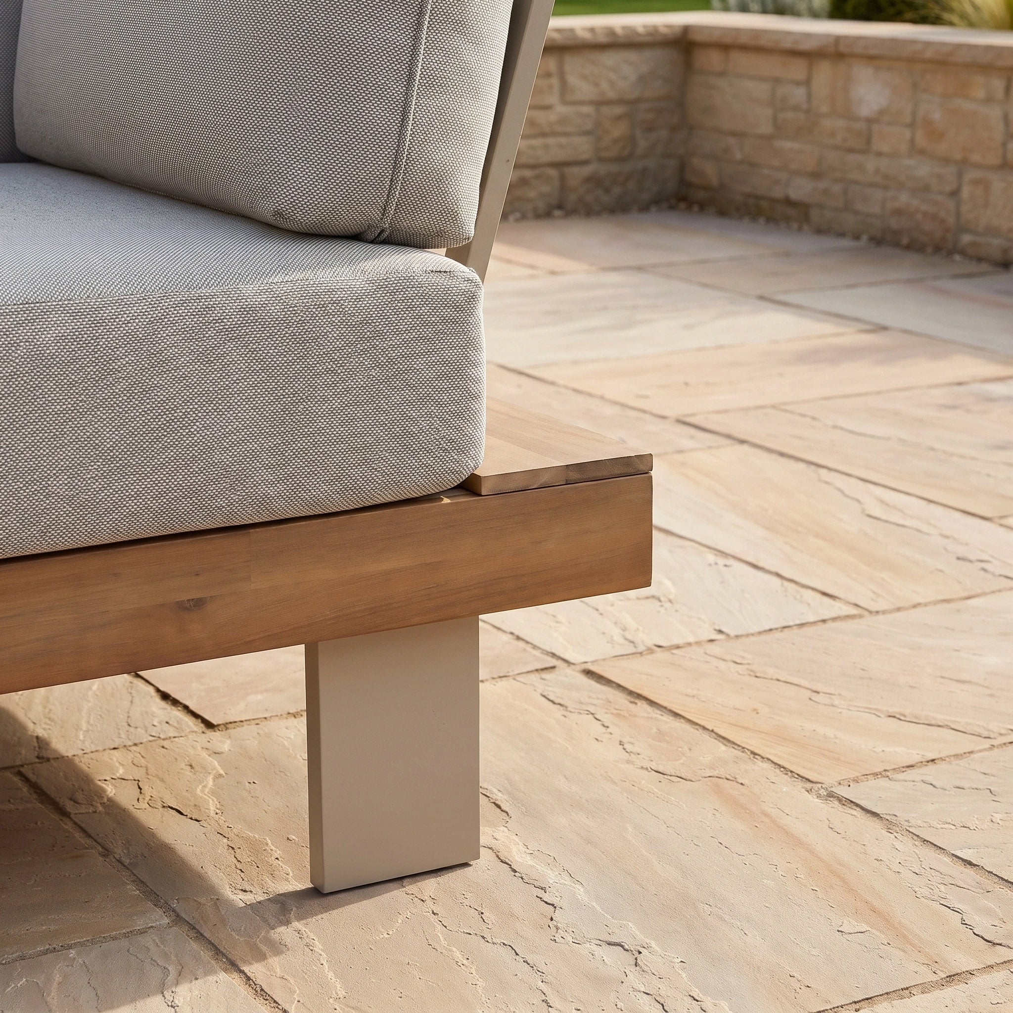 Ava Corner Sofa Set in Latte featuring light gray cushions on a sustainable acacia wood frame, perfect for elevating your outdoor furniture collection on any stone patio.