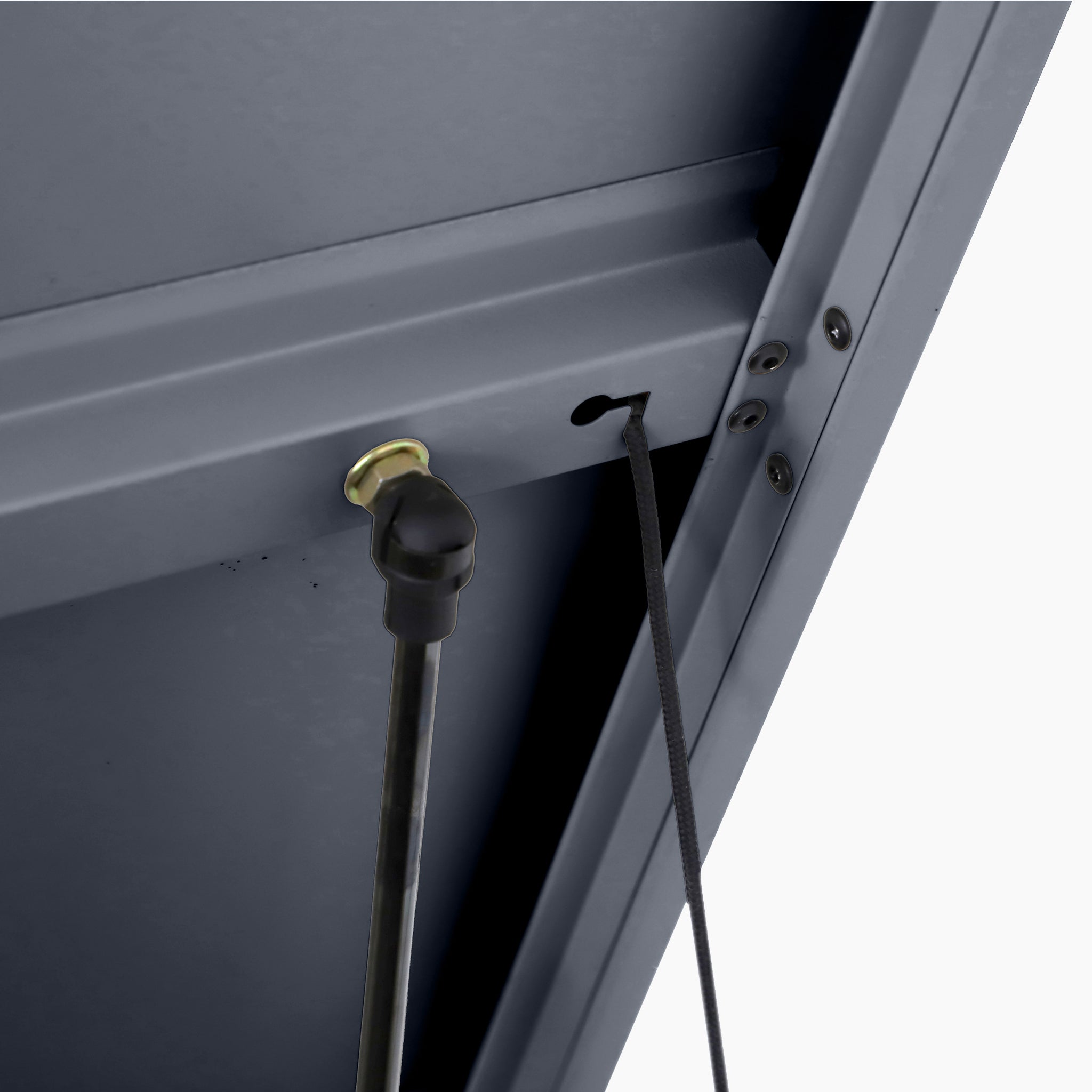 Close-up of the Pacific Lifestyle - Rhode Island Large Outdoor Cushion Box in Anthracite, showing its galvanised steel surface with a black cord and metal rod attached.