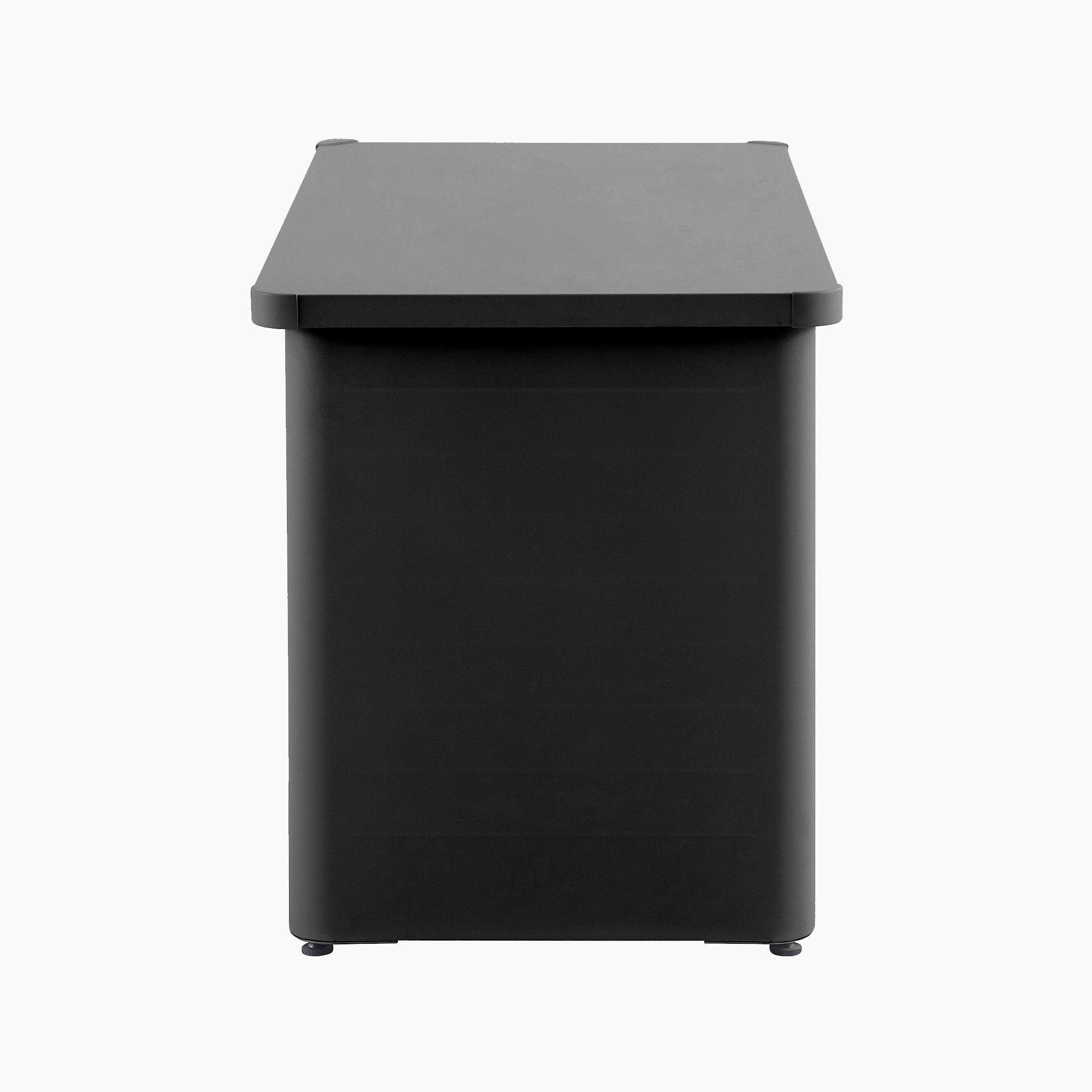 The Pacific Lifestyle Rhode Island Small Outdoor Cushion Box in Black features a sleek, modern profile and durable galvanised steel construction, shown from the side against a plain white background.