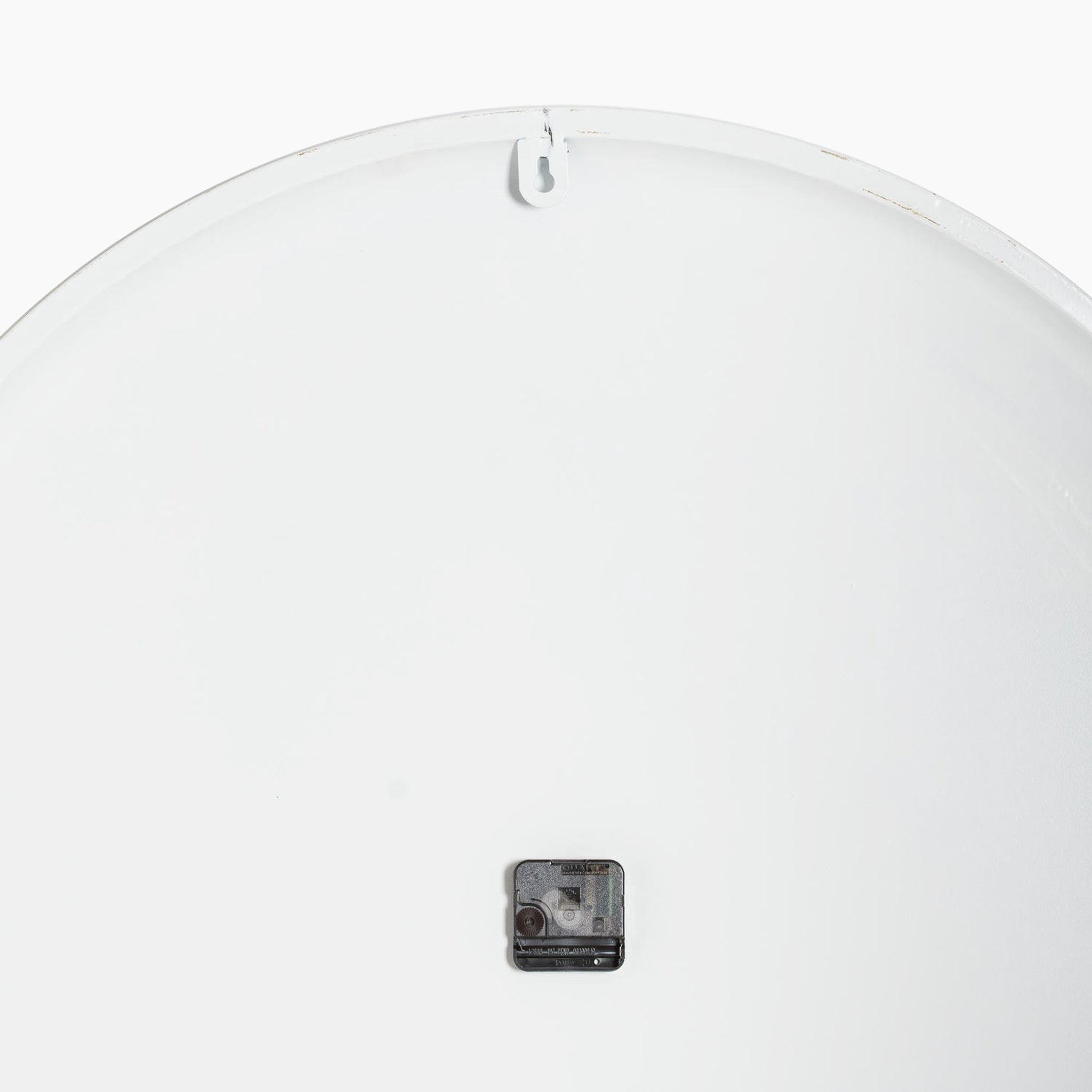 The Aubrey Large Wall Clock showcases a back view with its sleek silver-effect metal frame, a convenient hanging hook, and a minimalist design for the battery compartment.