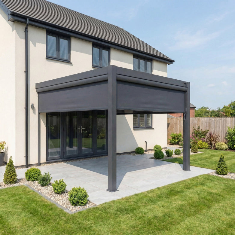 Modern house with a large PergoSTET Plus 3m x 3m Wall Mounted Pergola in grey, featuring tilting louvres, LED lighting, and 3 manual side blinds over a tiled patio in a landscaped backyard.