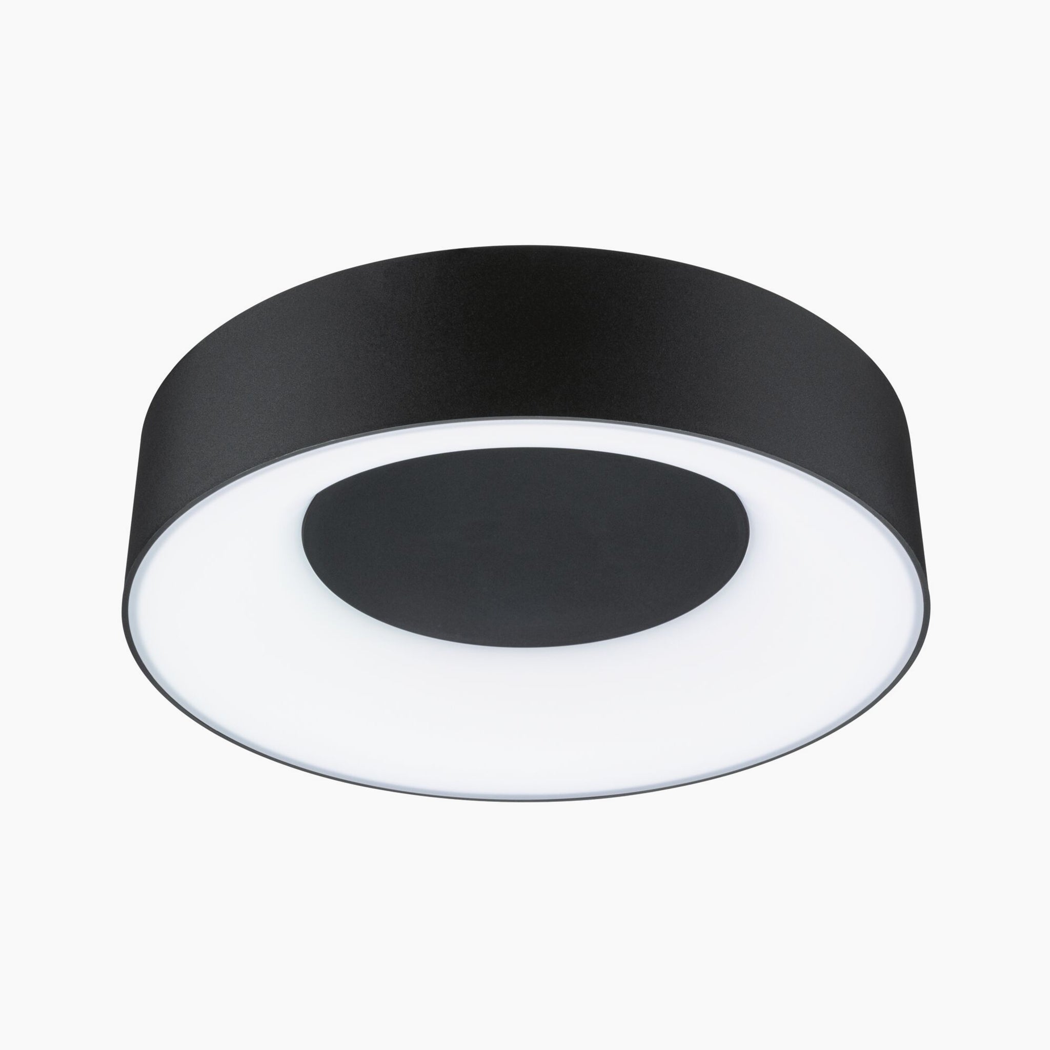 The Paulmann - Casca 18W LED Switch 1500lm Ceiling Light in Black Matt offers a sleek black design with a white diffused center, providing a soft lighting effect against the pristine white background.