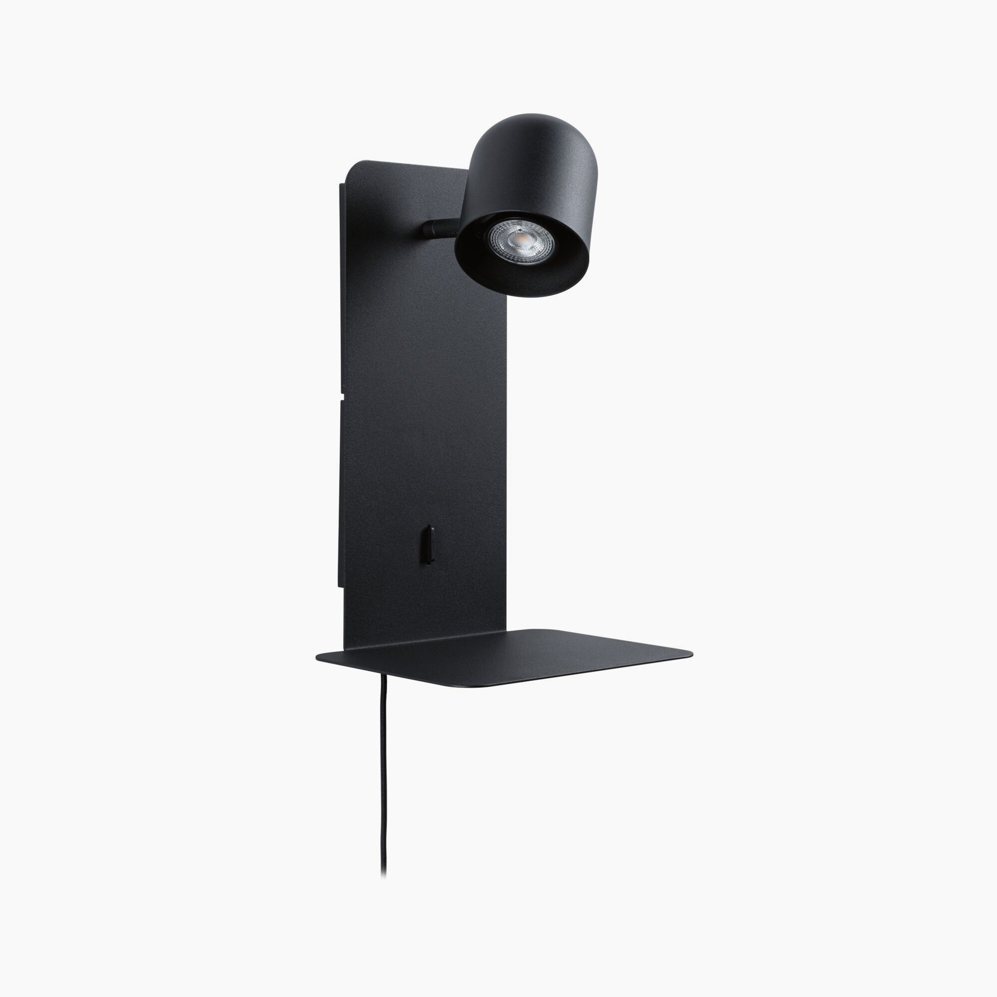 The Paulmann - Malena 5W Wall Light in Black Matt is a stylish wall-mounted luminaire that includes a small shelf, an attached electrical cord, and a USB Type-C charging port.