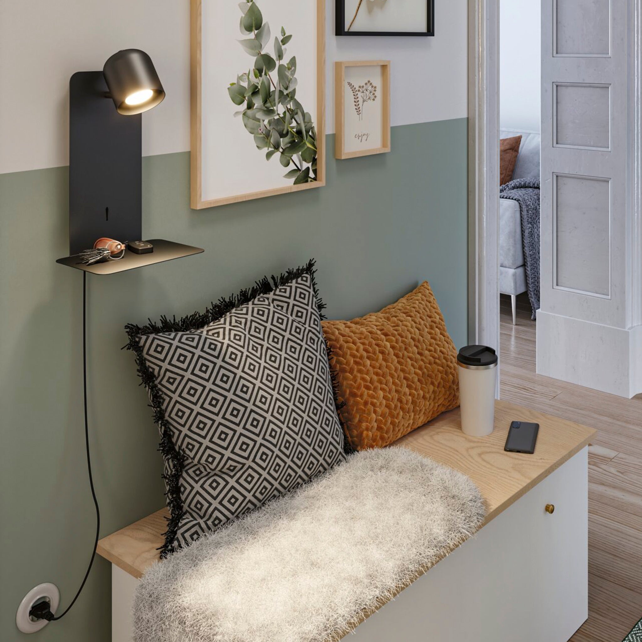 A cozy entryway includes a bench adorned with patterned cushions, a coffee cup, and the Paulmann - Malena 5W Wall Light in Black Matt. This wall-mounted luminaire features sunglasses resting on its small shelf and offers a convenient USB Type-C charging port for your gadgets.