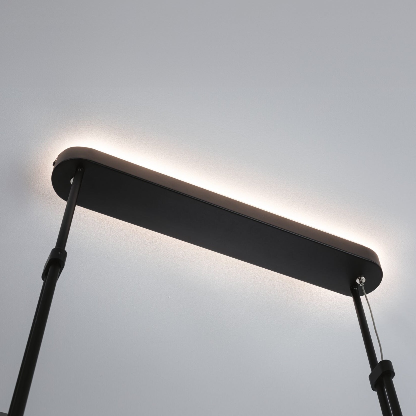 Paulmann's Puric Pane 6.5W LED 6 Lamp Pendant Light in Black casts a soft white glow and sits elegantly on a white ceiling, offering minimalist charm with its 3-step dimming feature.