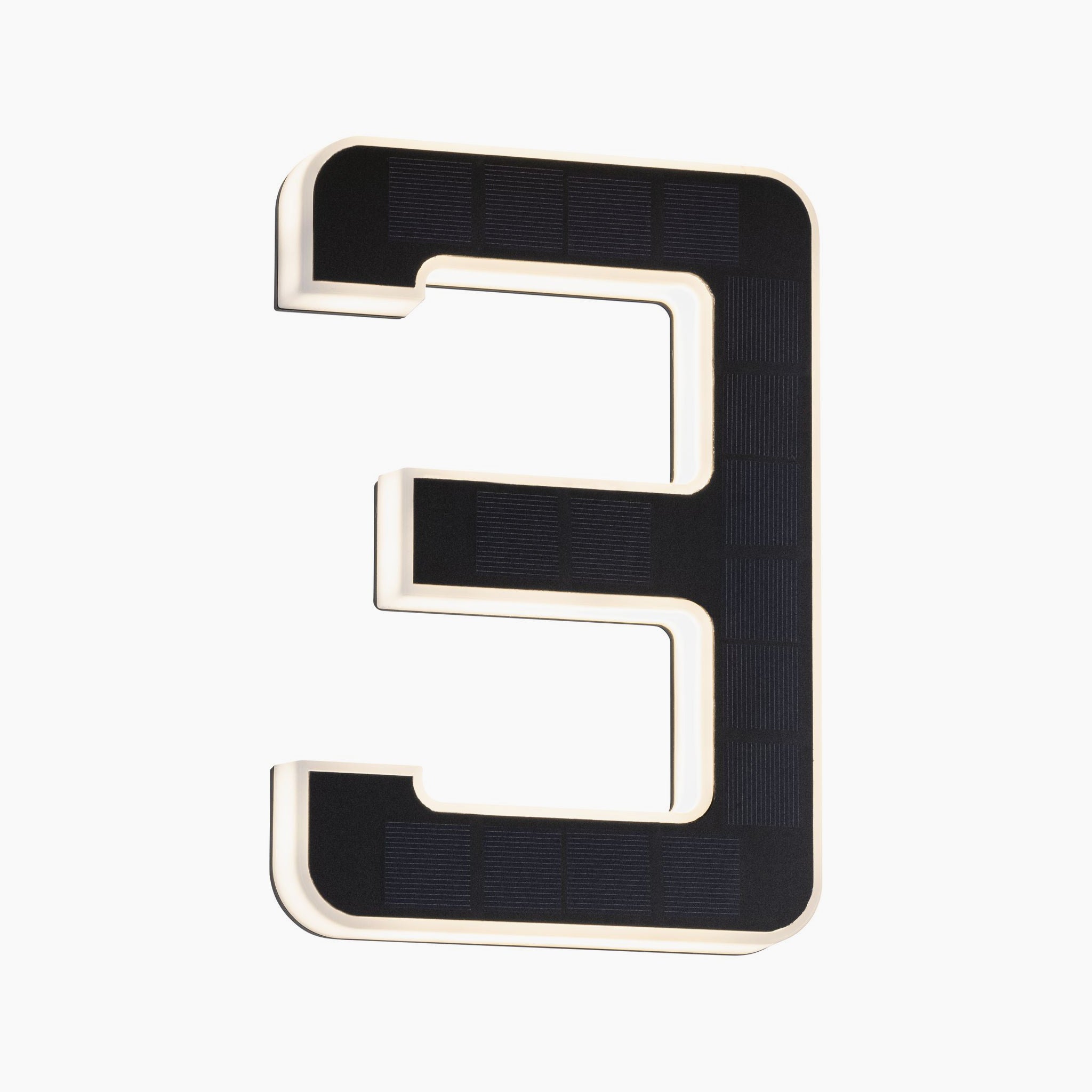 Paulmann's Outdoor Solar House Number 3 features a sleek black design with LED illumination powered by a 0.2W replaceable battery against a pristine white background.