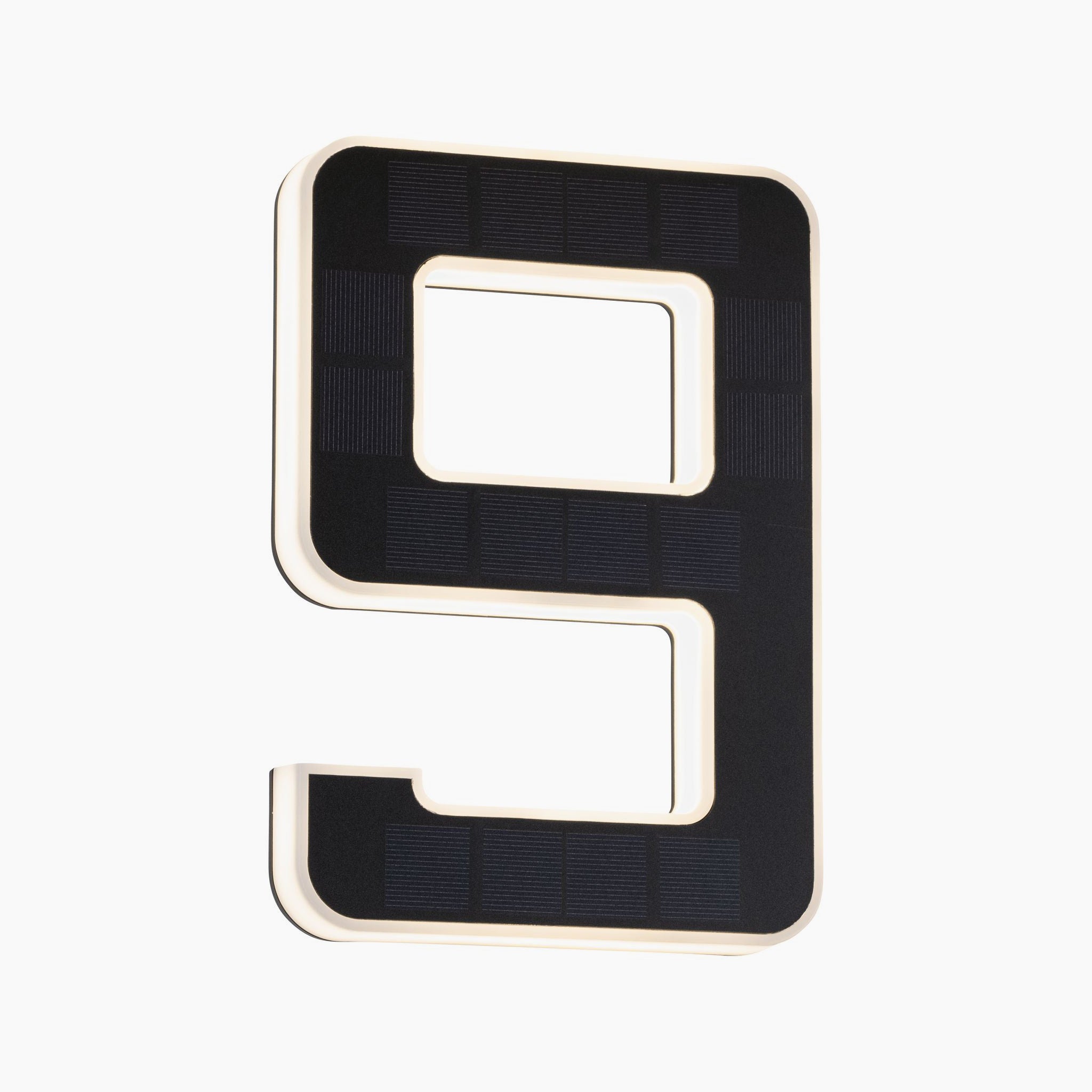 The Paulmann Outdoor Solar House Number 9 LED, equipped with a replaceable battery and designed in black, showcases a bold number nine on a crisp white background.