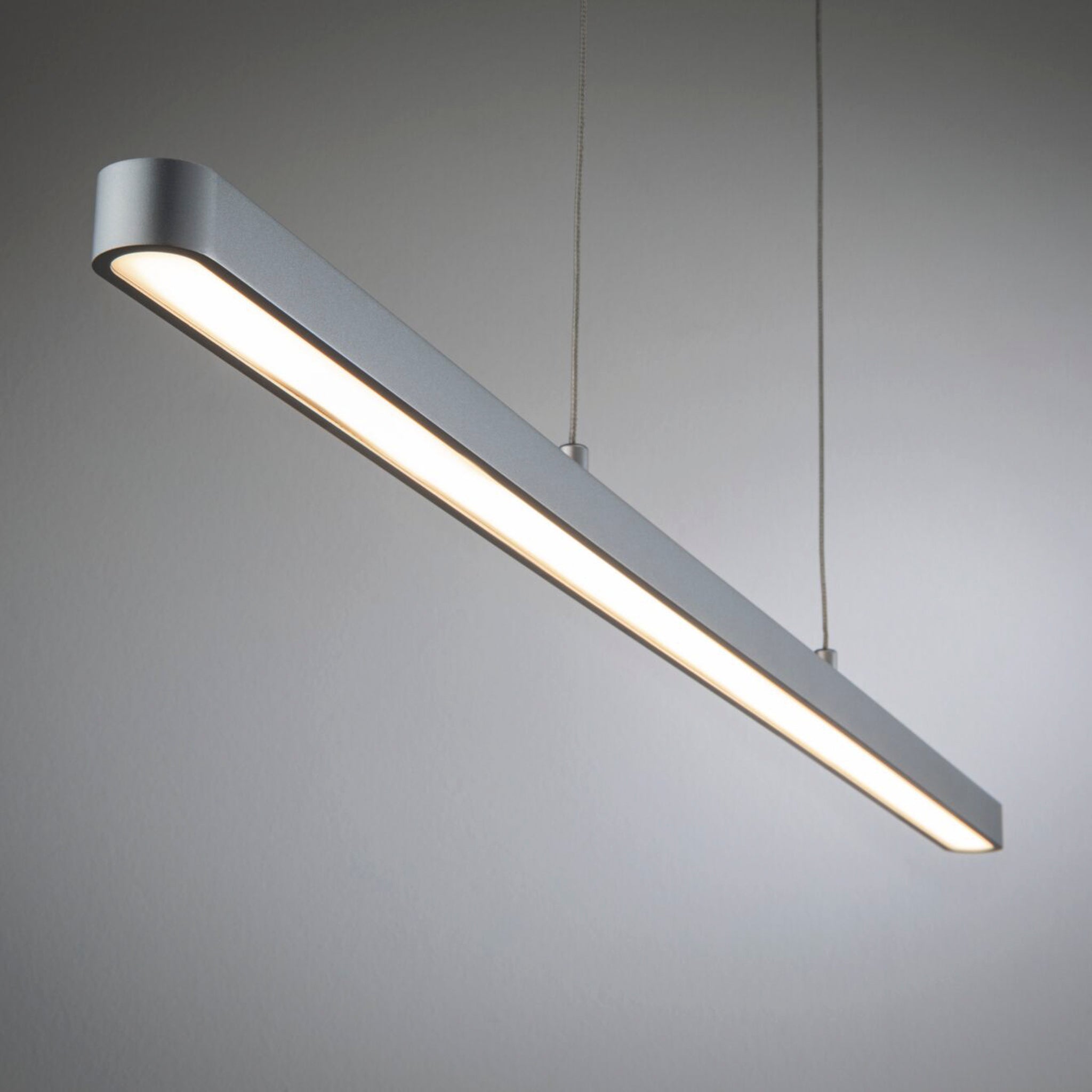 The Paulmann Lento 37W LED Dimmable Pendant Light in Chrome Matt is a modern and sleek fixture with a minimalist design, offering adjustable height and high lumen output, making it perfect for any setting.