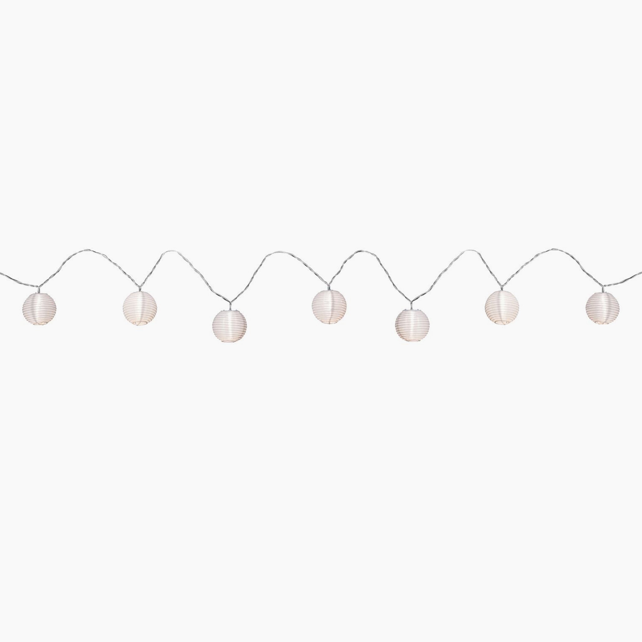 The Paulmann Outdoor Lampion LED 3.6m Fairy Lights in Warm White offers a string of white paper lanterns on a transparent cable, perfect for enhancing the outdoor ambiance with their gentle glow. This set of mobile lampion fairy lights is easily rechargeable via USB, ensuring effortless lighting wherever it's needed.