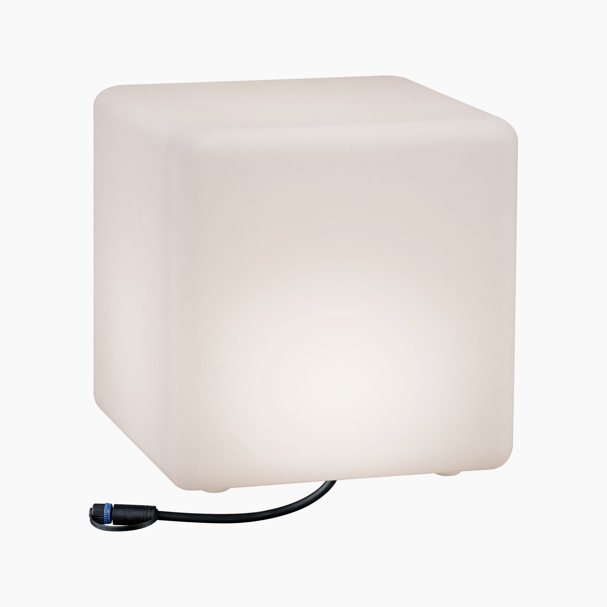 A radiant Paulmann Plug & Shine Outdoor Cube 6.5W LED floor lamp, featuring a sleek white design with a black power cord, ideal for enhancing outdoor spaces.