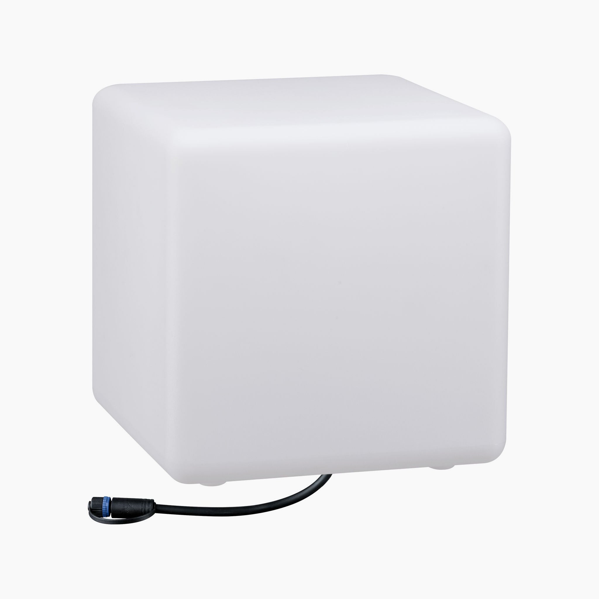 The Paulmann - Plug & Shine Outdoor Cube 6.5W LED 30cm Floor Lamp with Ground Spike is a white illuminated cube that boasts a sleek black power cable against a simple background. Perfect for outdoor lighting, it introduces a modern touch of elegance to any setting.