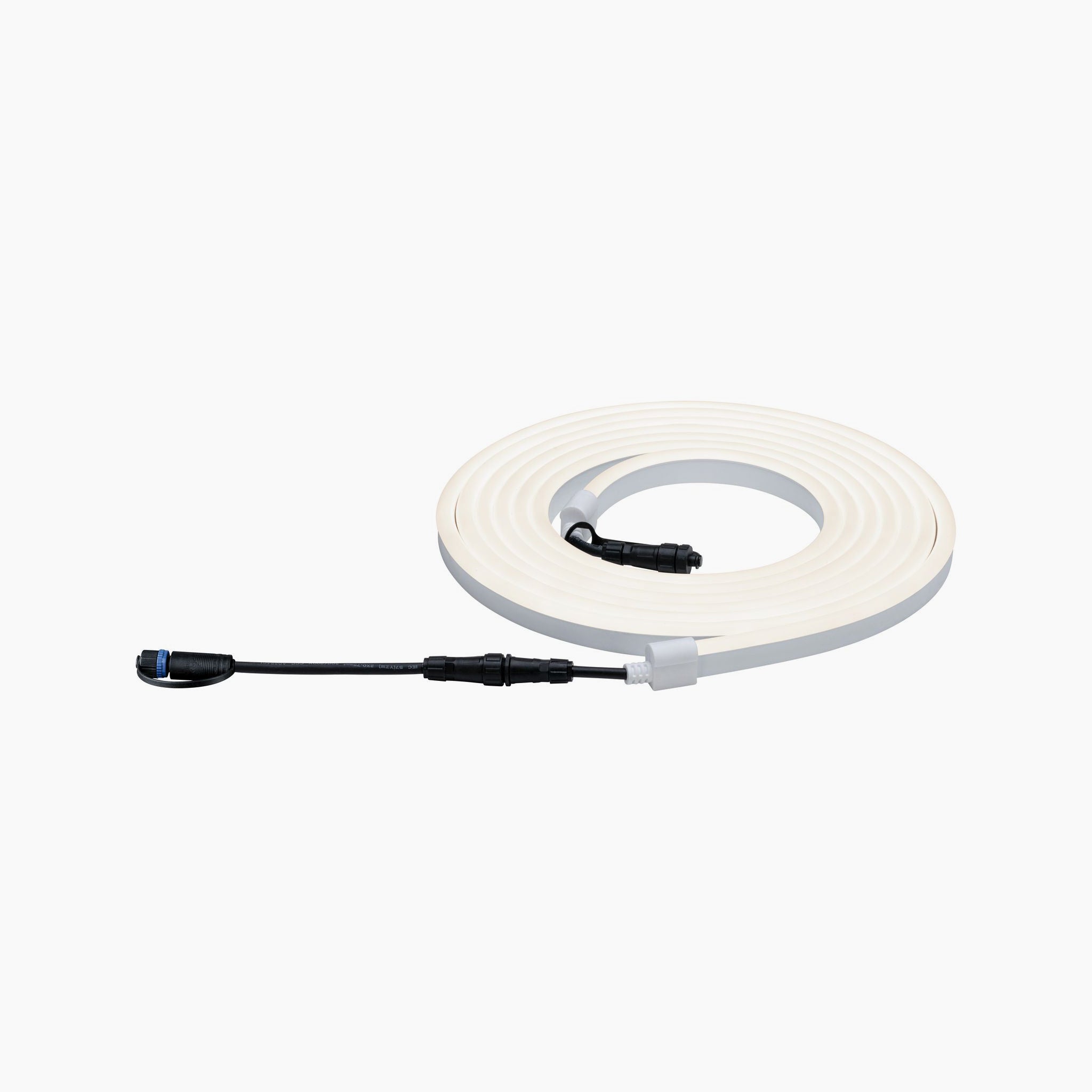 A coiled white LED light strip with black connectors on each end lies against a plain background, its homogeneous light reminiscent of the Paulmann - Plug & Shine Outdoor 31W LED Light Strip in Warm White.