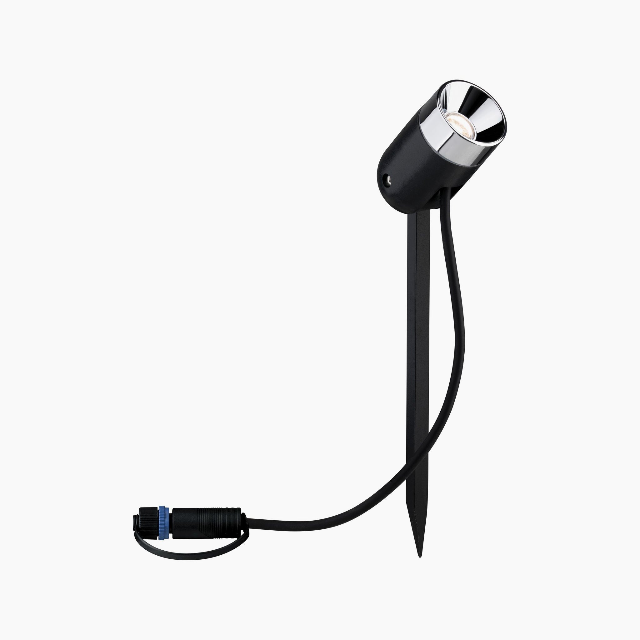 The Paulmann Plug & Shine Outdoor Pike 4.5W LED Warm White Individual Spotlight in Anthracite, complete with a durable ground spike and attached cable, is an elegant solution for improving outdoor lighting against a crisp white backdrop.