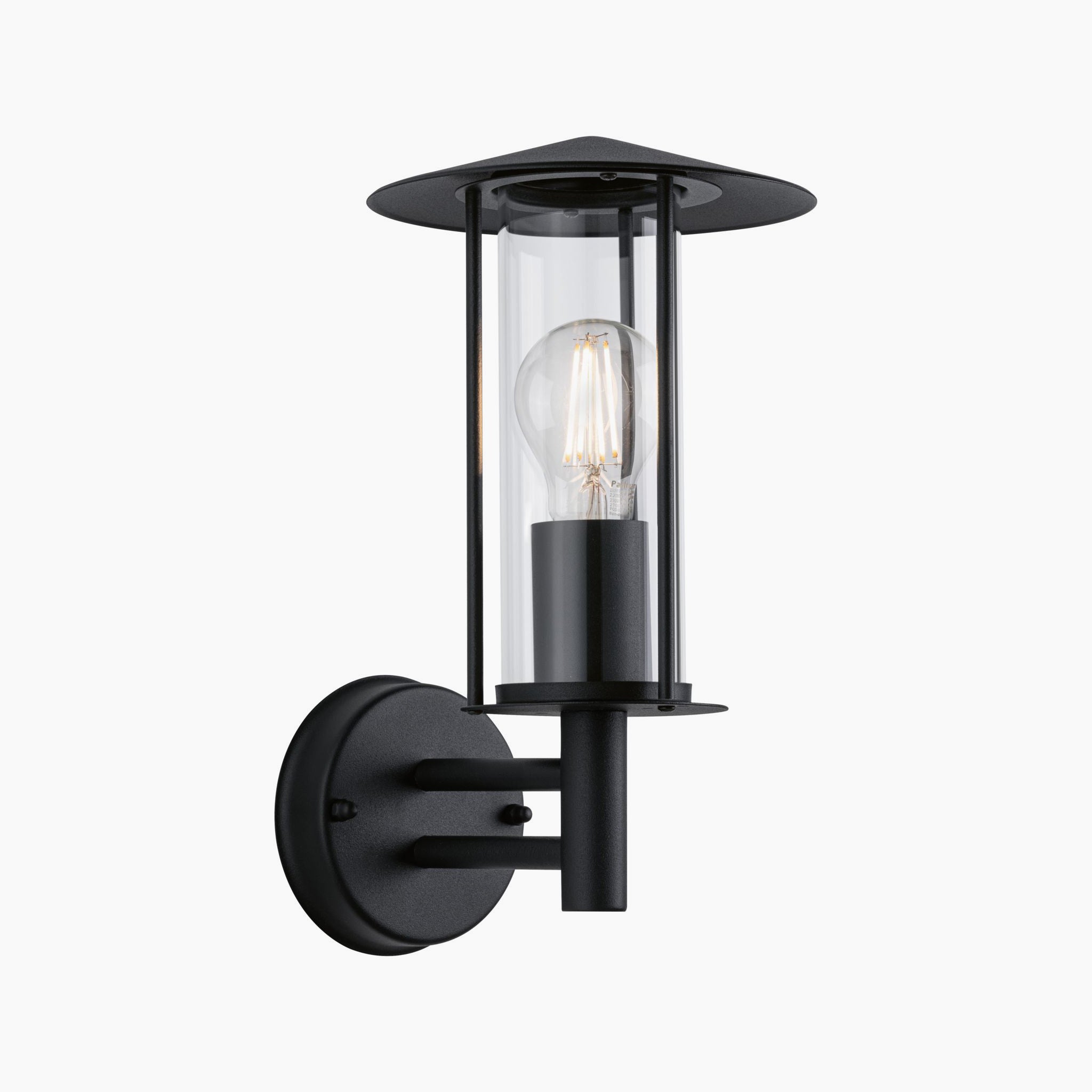 Paulmann's Outdoor Classic 15W LED Wall Light in Dark Grey features a clear glass casing and exposed bulb design, making it ideal for illuminating exterior walls while providing IP44 protection against the elements.