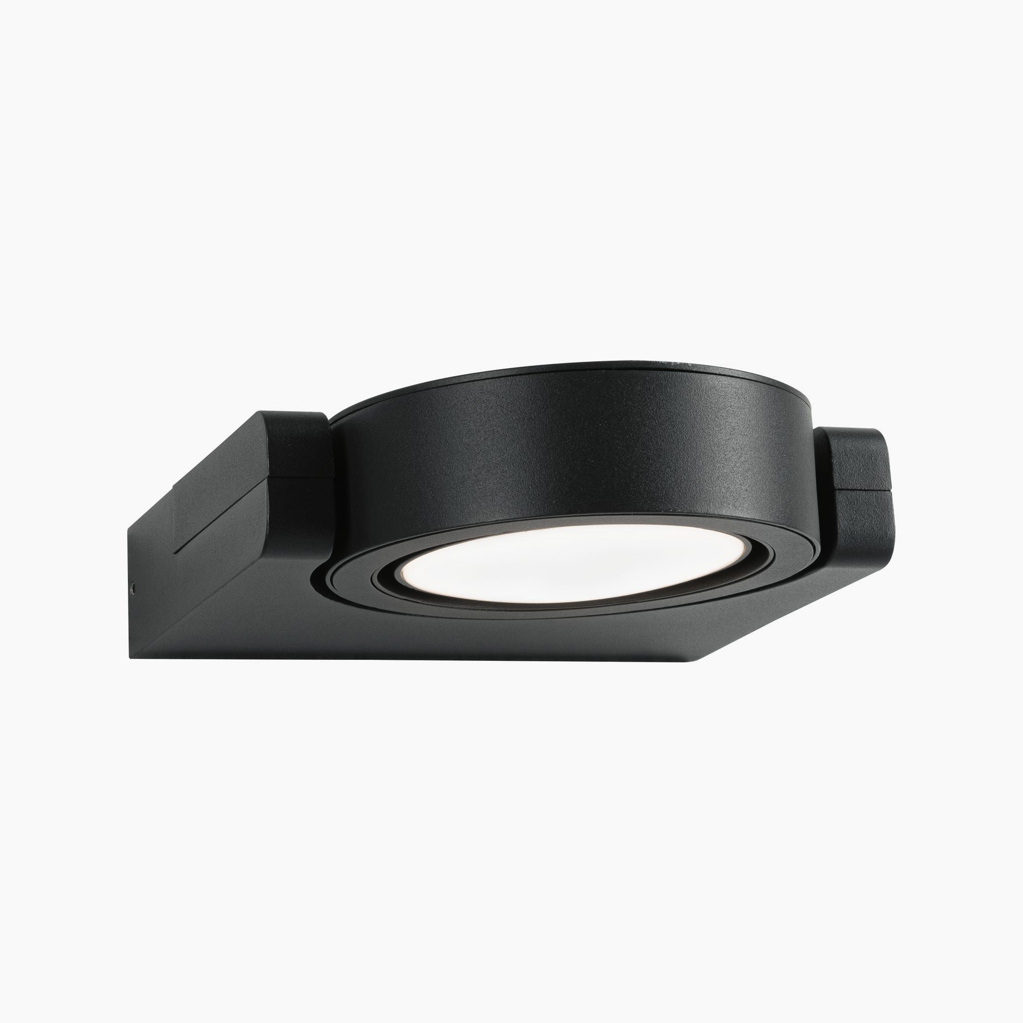 The Paulmann - Outdoor Swivea 8W LED Wall Light in Anthracite is a stylish, circular black luminaire designed for exterior walls, featuring cardanic swiveling for precise light direction.