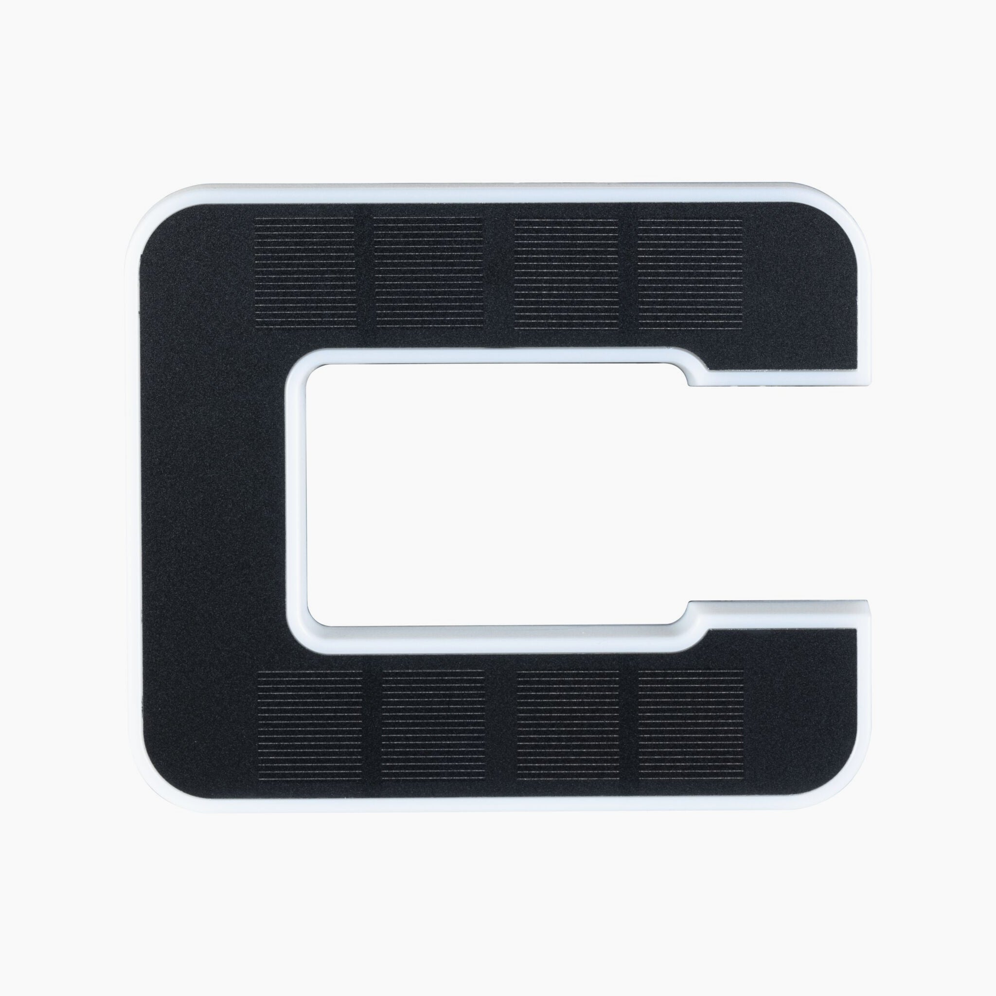 The Paulmann - Outdoor Solar House Letter C LED 0.2W with Replaceable Battery in Black, with its textured black and white "C" shape when viewed from above, resembles a sleek solar-powered device.