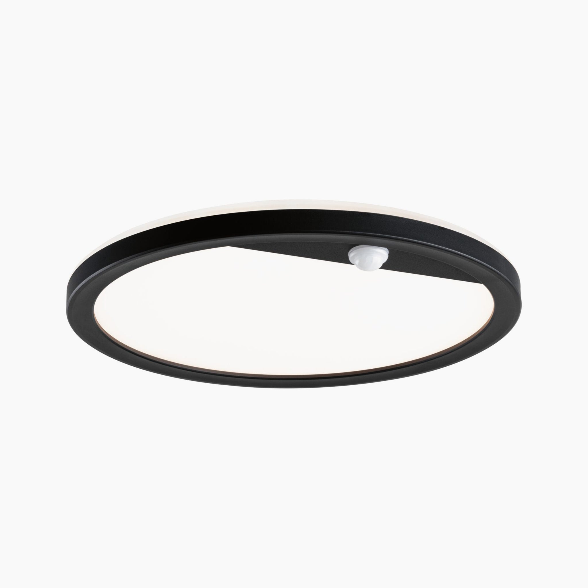 The Paulmann outdoor round Lamina panel ceiling light boasts a modern black design, highlighted by its white diffuser and centered integrated motion sensor.