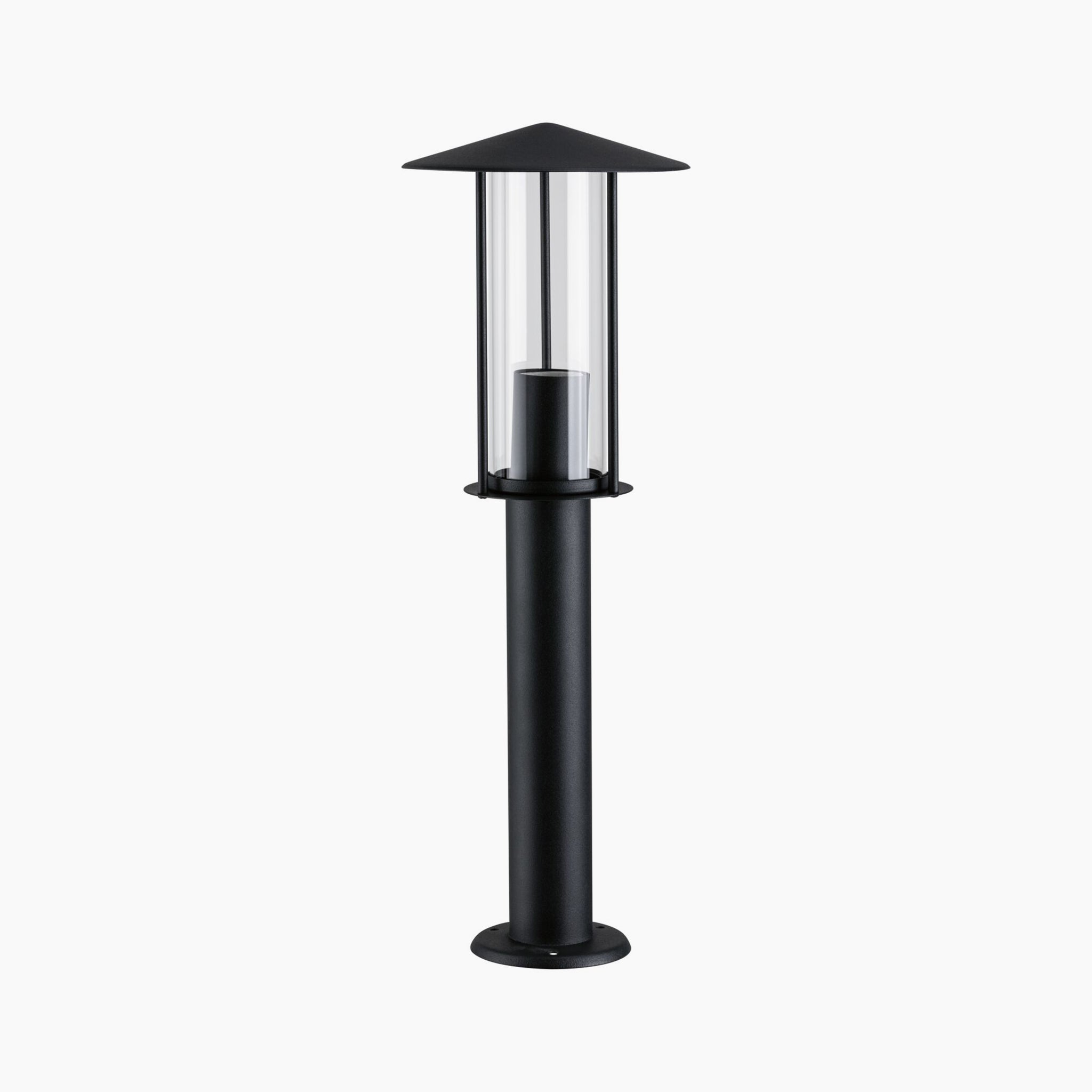 The Paulmann Outdoor Classic 15W LED Bollard Light in Black is a tall outdoor lamp post that features a cylindrical glass enclosure and a sloped top, designed to be insect-friendly.