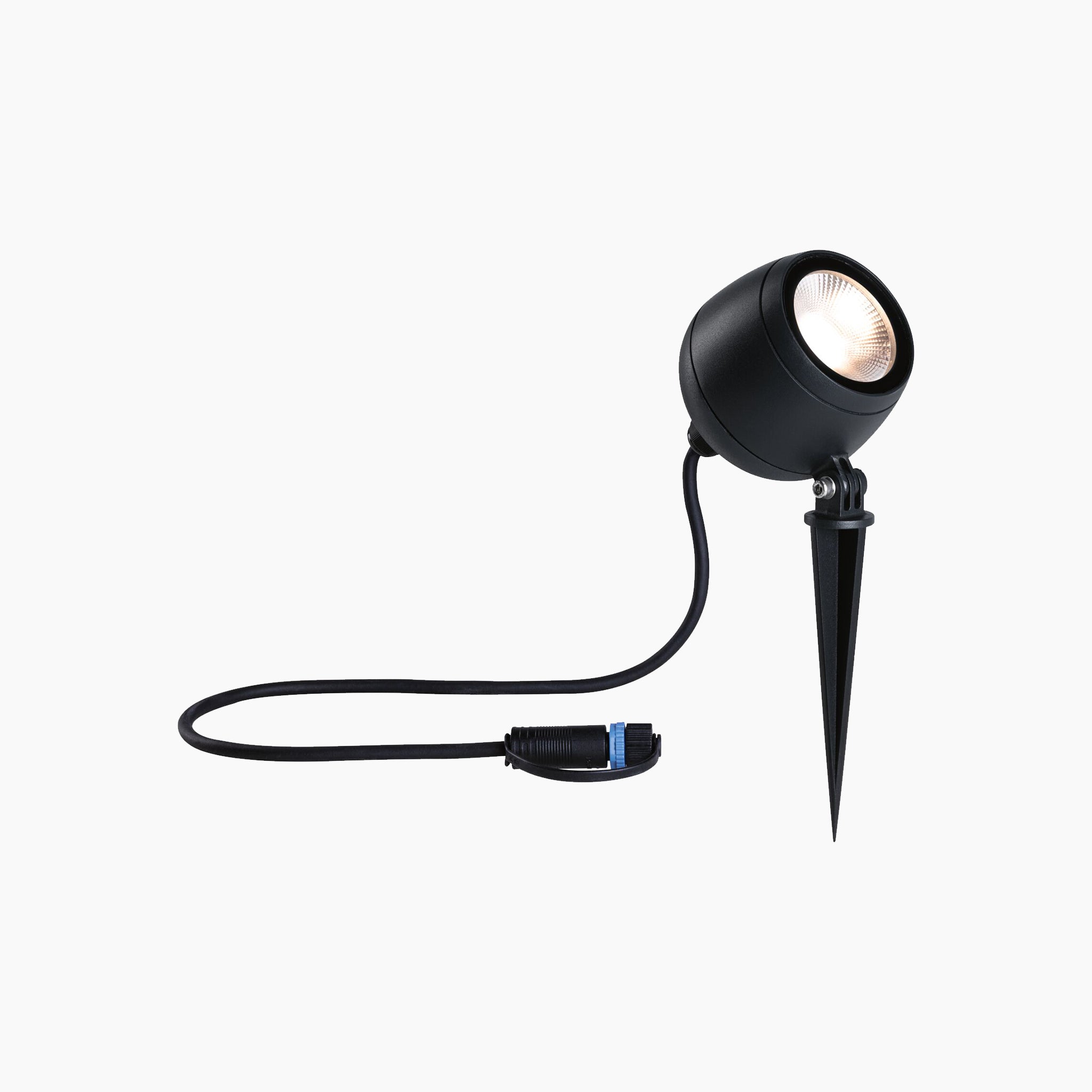 Paulmann's Plug & Shine Outdoor Kikolo 7.2W LED Garden Spotlight in Anthracite, featuring a 60-degree beam angle, comes with a ground spike and attached cable for easy outdoor installation, providing warm white light to enhance the ambiance.