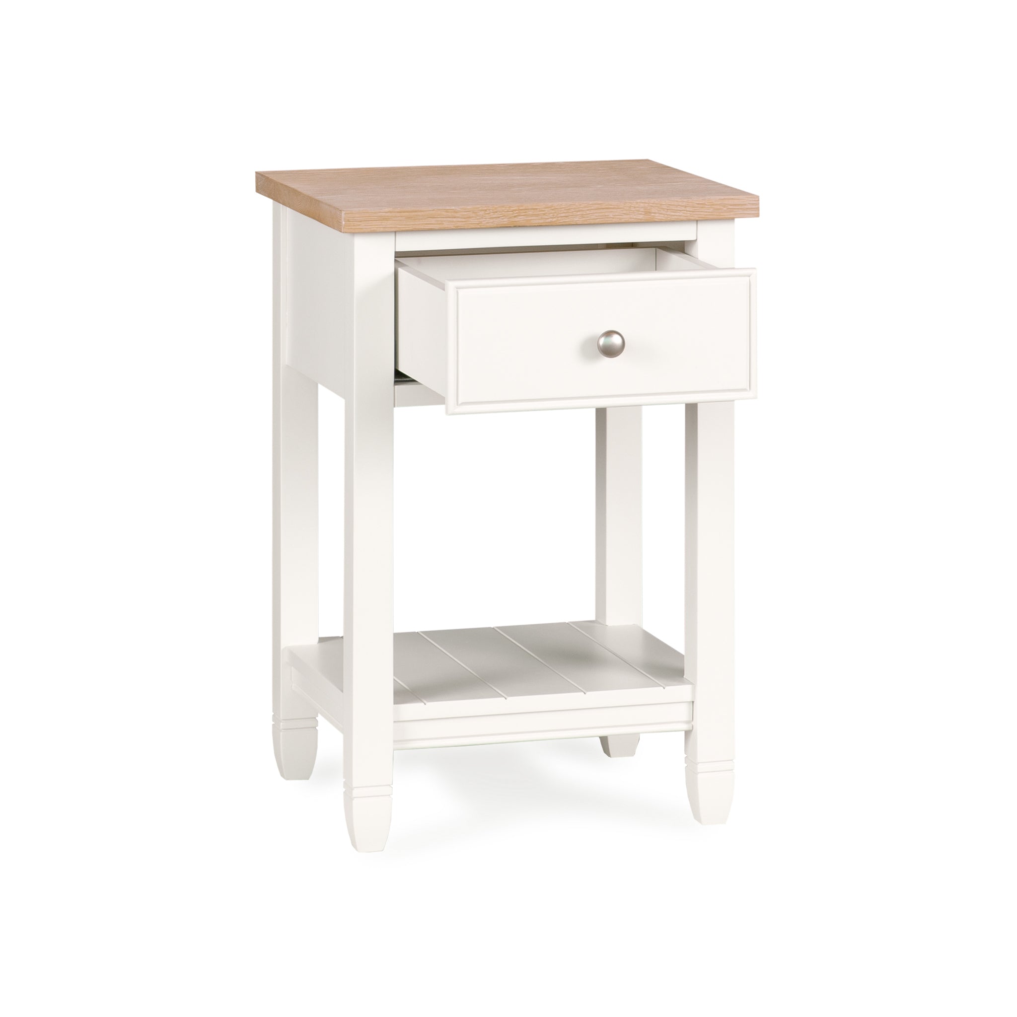 The Amberley Bedside Table in Warm White is a compact nightstand with a wooden top, single drawer, and lower shelf—ideal for adding modern country charm to your bedroom.