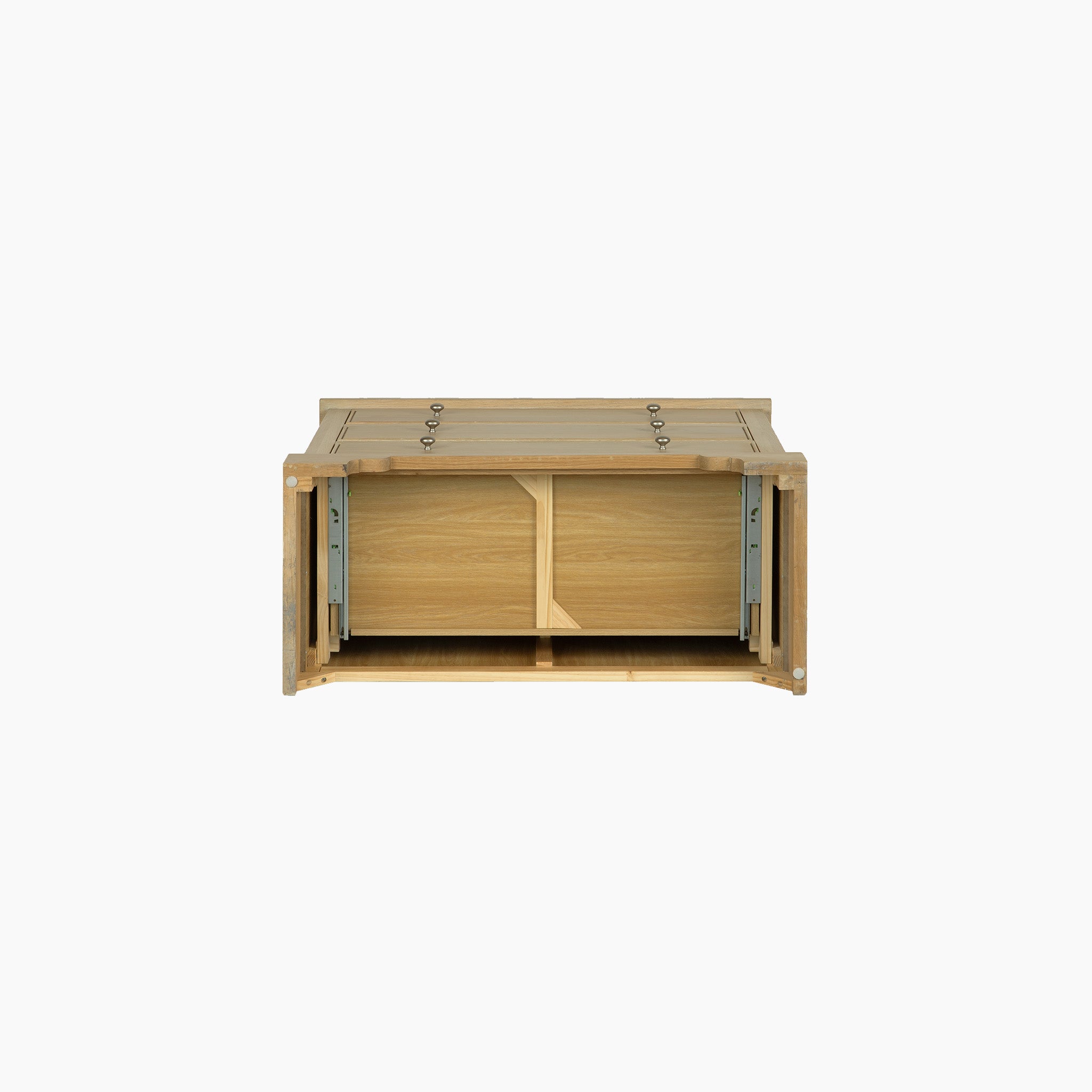 The Amberley 3 Chest of Drawers in Light Oak features an open-front design with metal rails, resembling a wooden storage box, and is shown from the front against a white background.