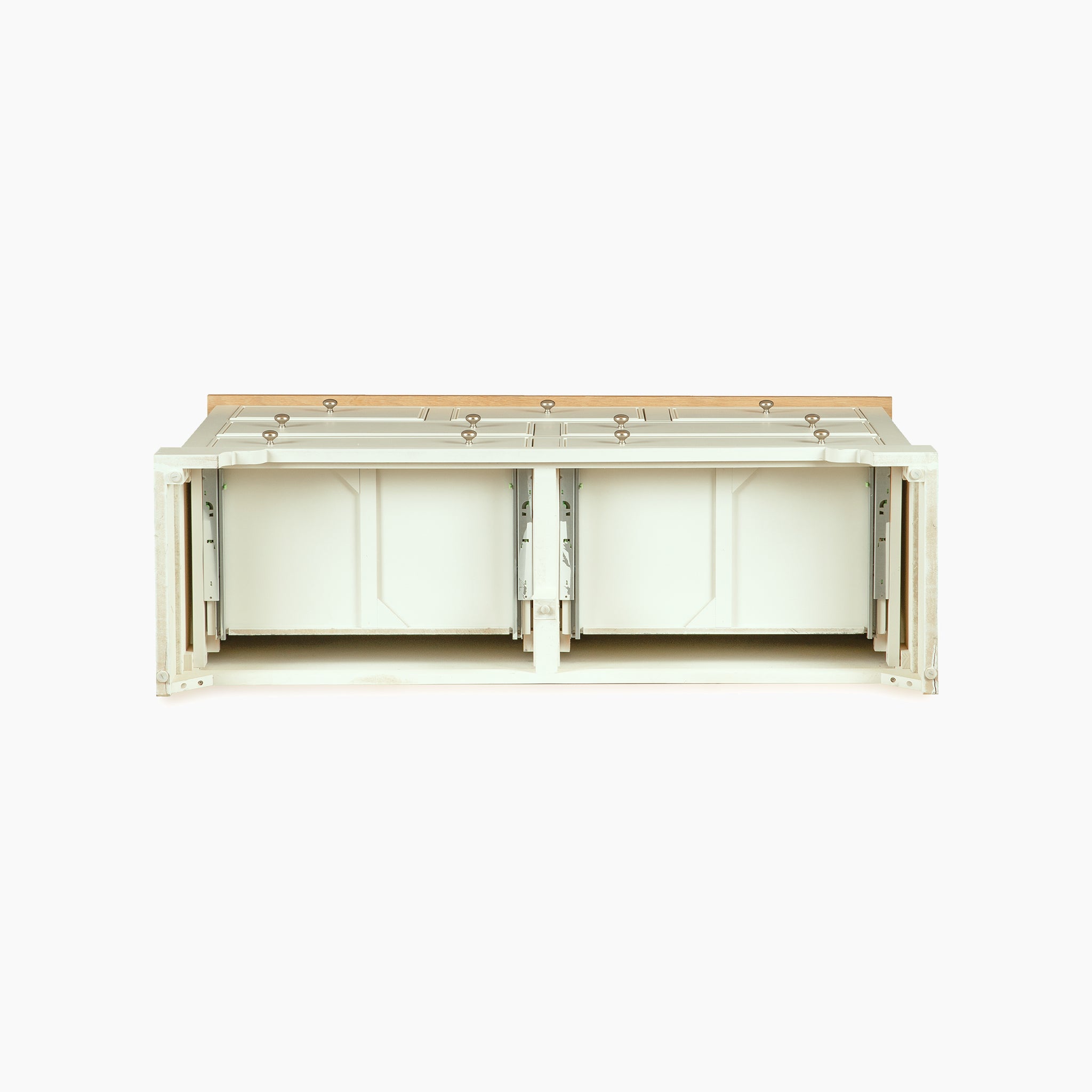 The Amberley 3 Over 4 Chest of Drawers in Warm White features an oak top and is shown from the front with two drawers open.