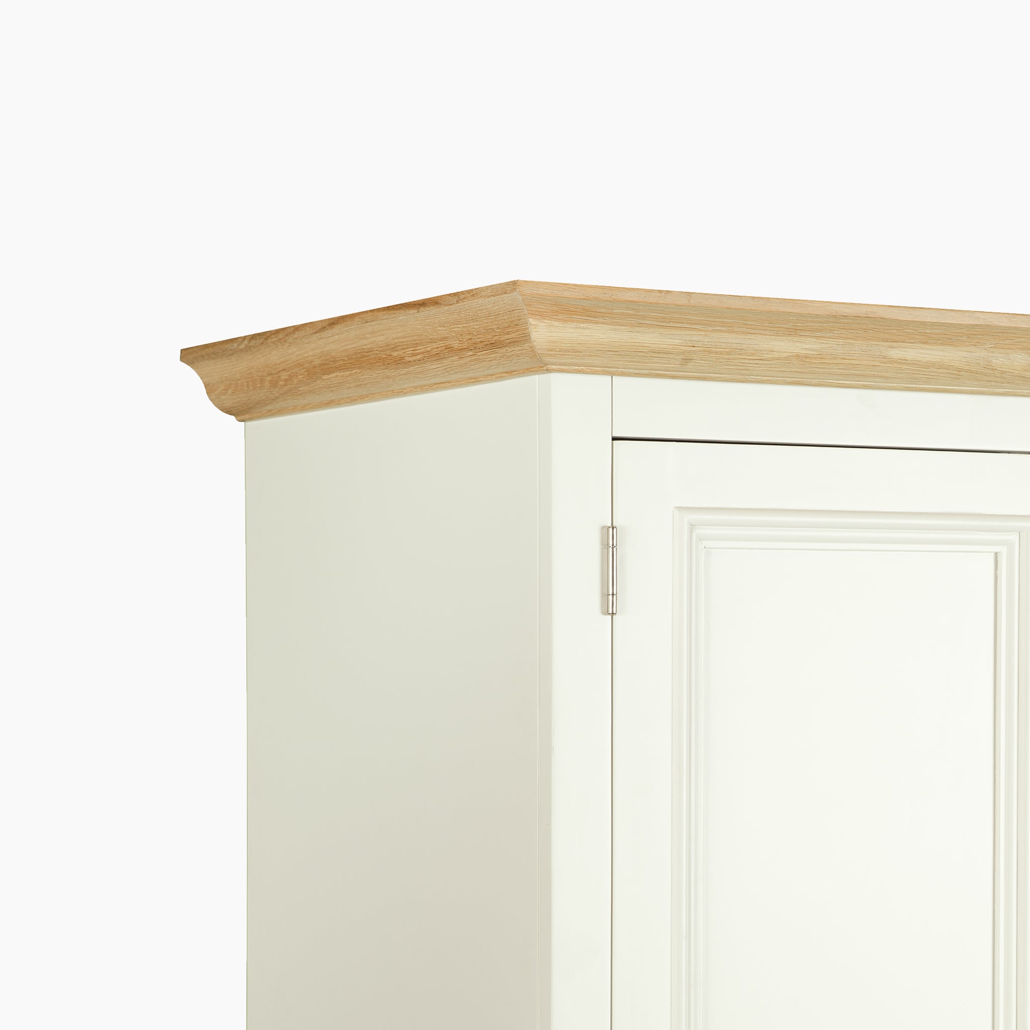 Corner view of the Amberley Double Wardrobe in Warm White, showcasing its natural wood top and paneled door—ideal for elegant bedroom storage.