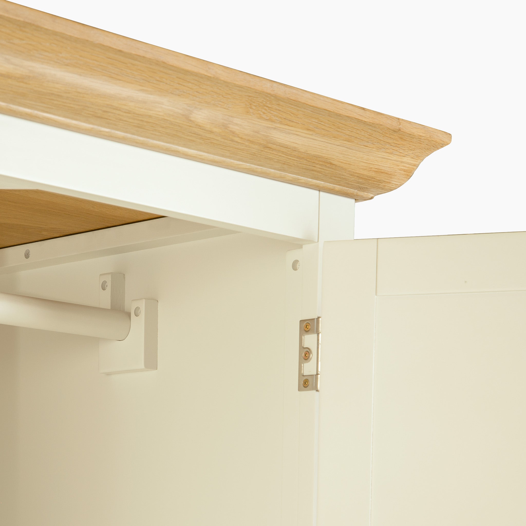 Close-up of the Amberley Double Wardrobe in Warm White, with a wooden top and an internal hanging rod—ideal for stylish bedroom storage.