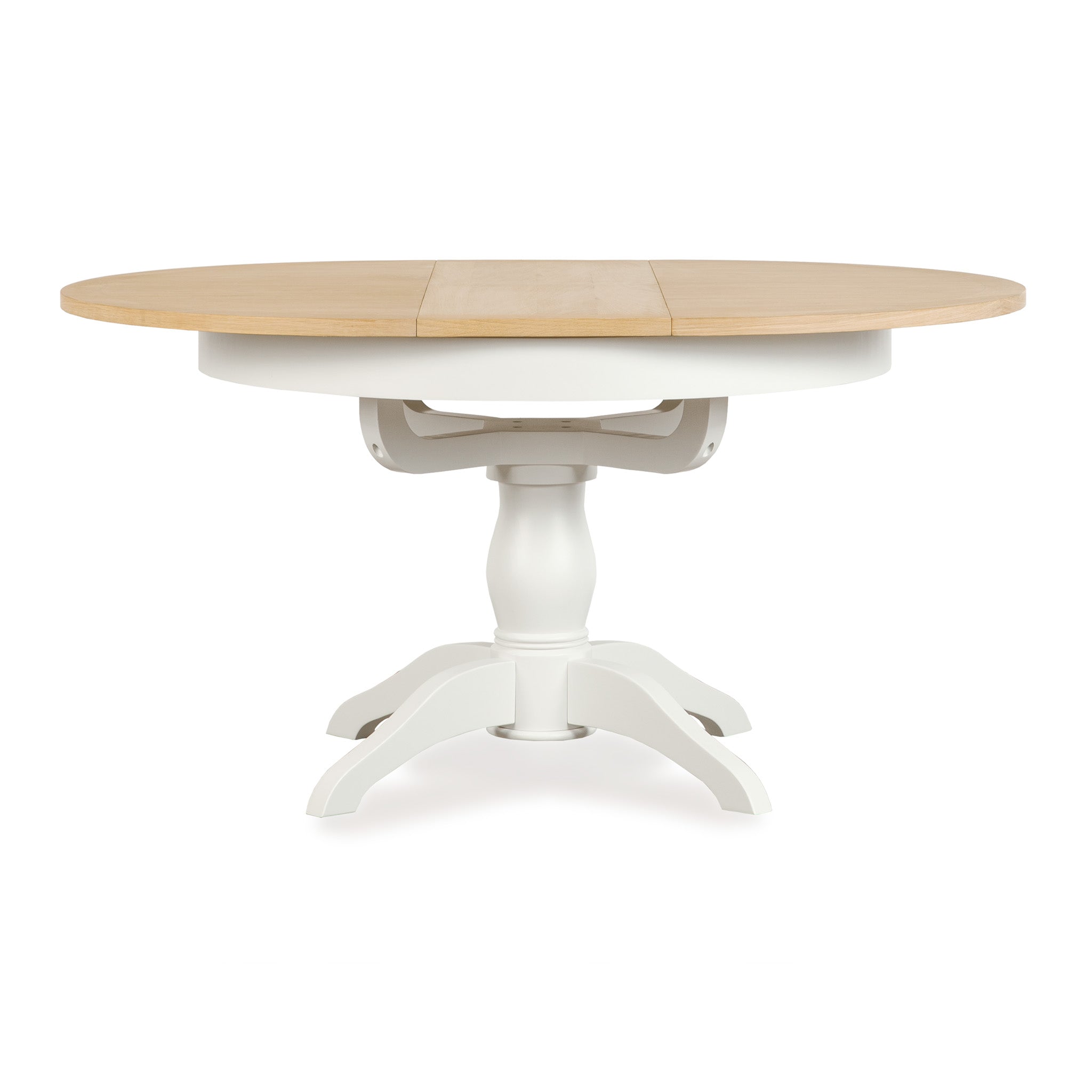 The Amberley 4-6 Seater Round Extending Dining Table features a light oak top and a warm white pedestal base with four curved legs.