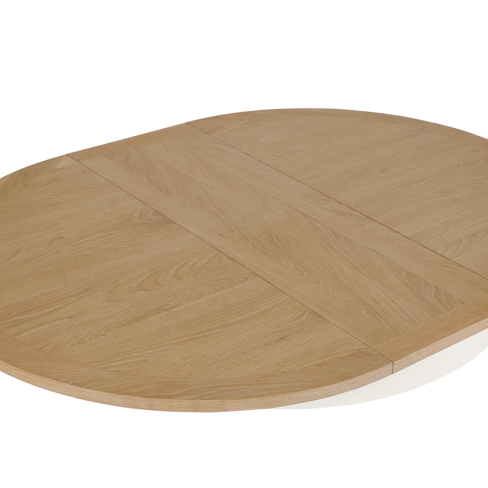 The Amberley 4-6 Seater Round Extending Dining Table in Warm White features a light wood tabletop with a subtle grain pattern and a central seam dividing the surface.