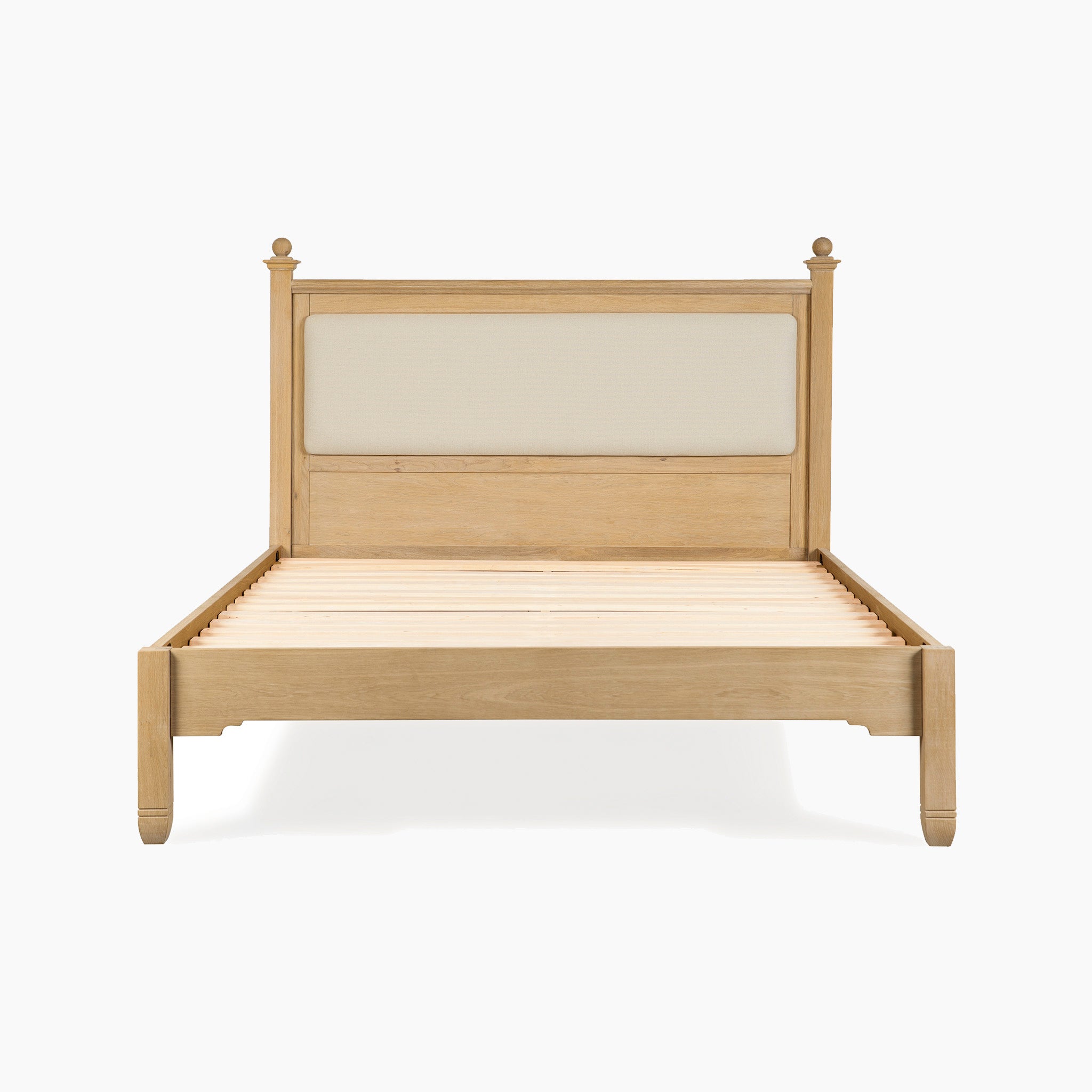The Amberley 5ft Kingsize Bed Frame in Light Oak features a beige upholstered headboard and is shown front-facing on a white background, adding timeless elegance and warmth to any bedroom.