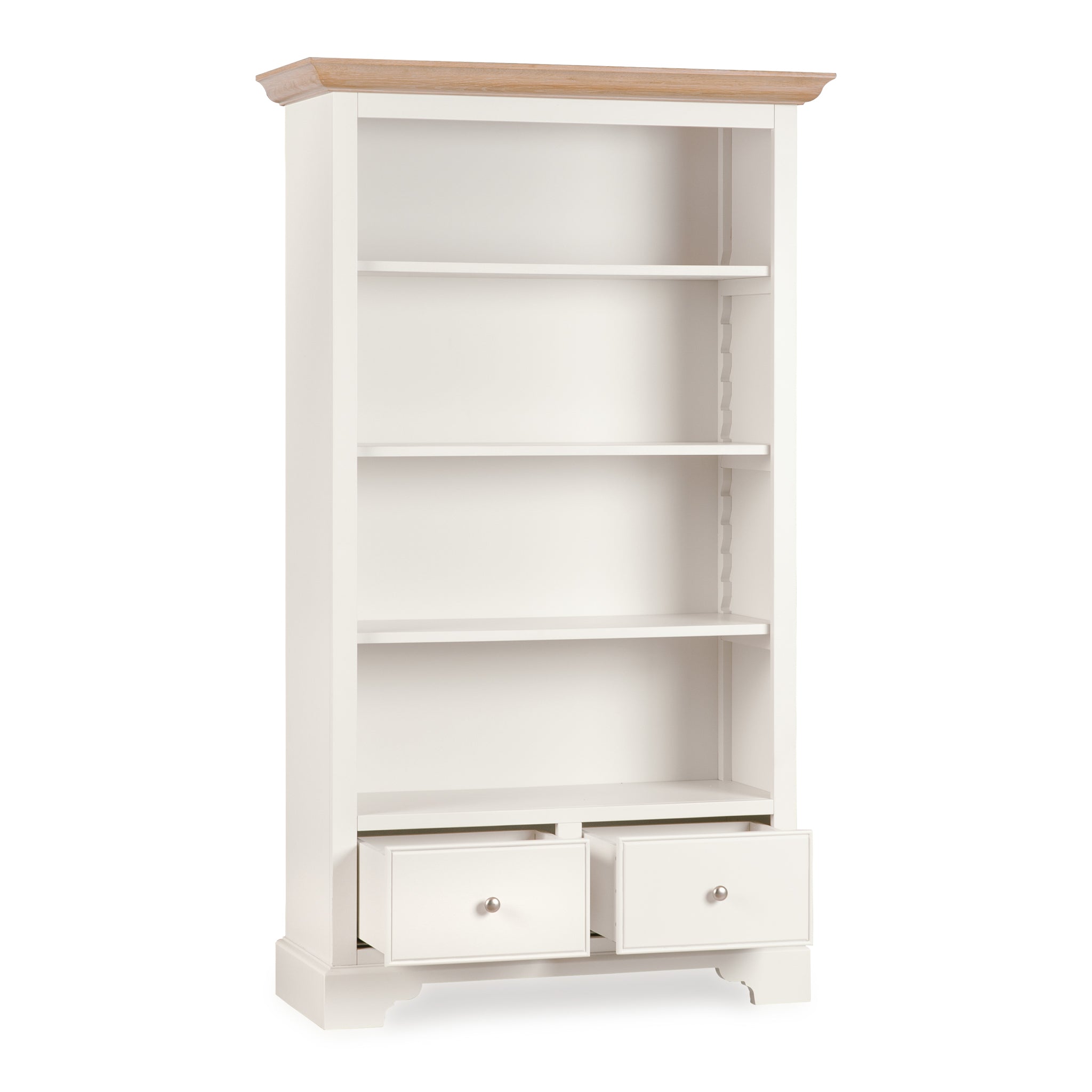 The Amberley Large Bookcase in Warm White features four shelves, a light wood top, and two open drawers—ideal for adding farmhouse charm to your home.