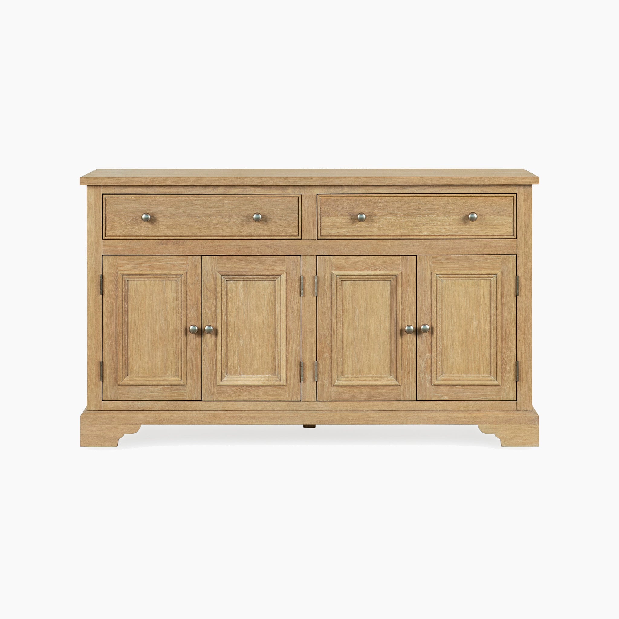 The Amberley Large 4 Door 2 Drawers Sideboard in Light Oak features two top drawers, four cabinet doors with metal knobs, and a natural finish—providing ample storage and a stylish touch to any room.