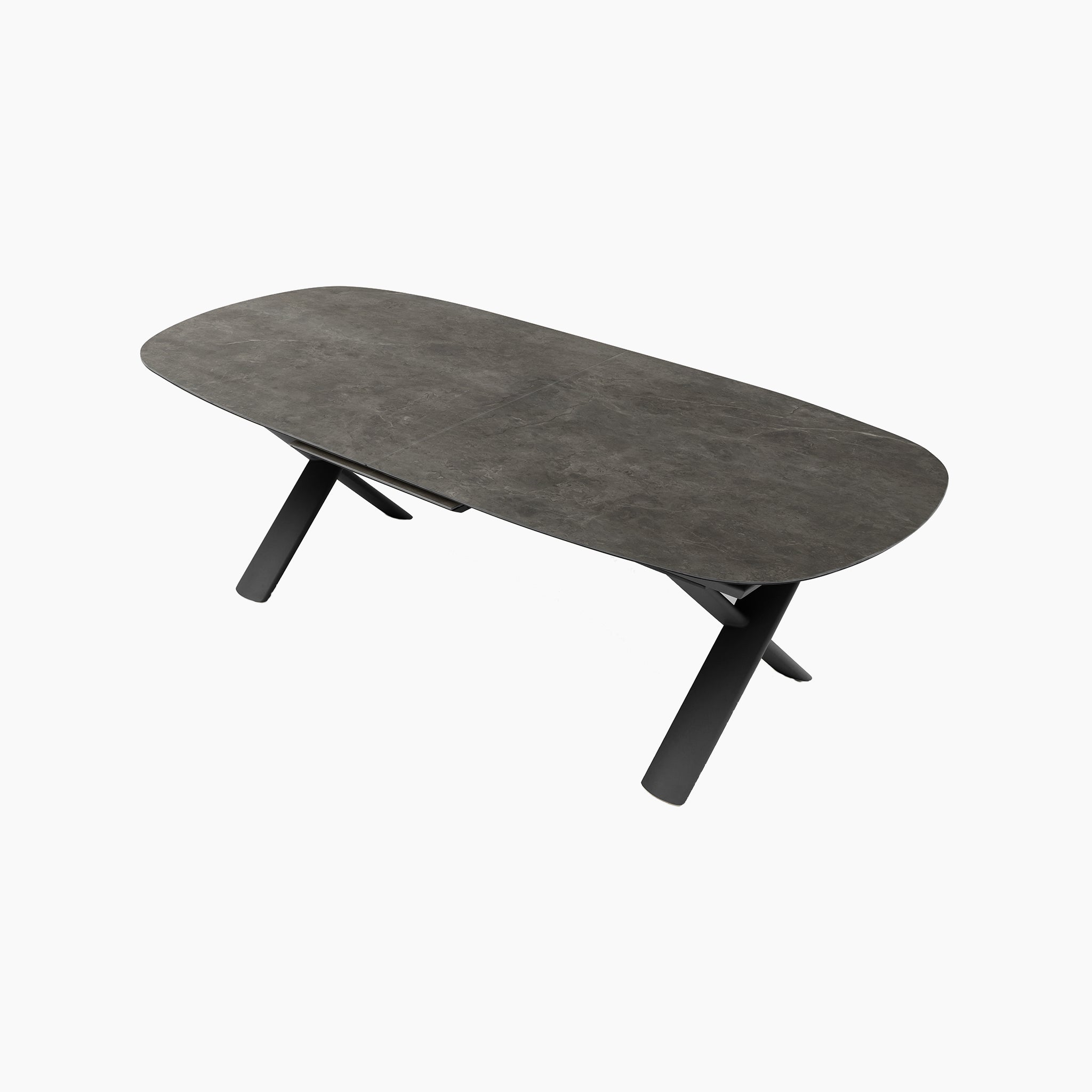 The Albatross 8 Seat Oval Dining Table in Charcoal features a sintered stone top and angled black legs; this weather-resistant outdoor table offers sleek design and lasting durability.