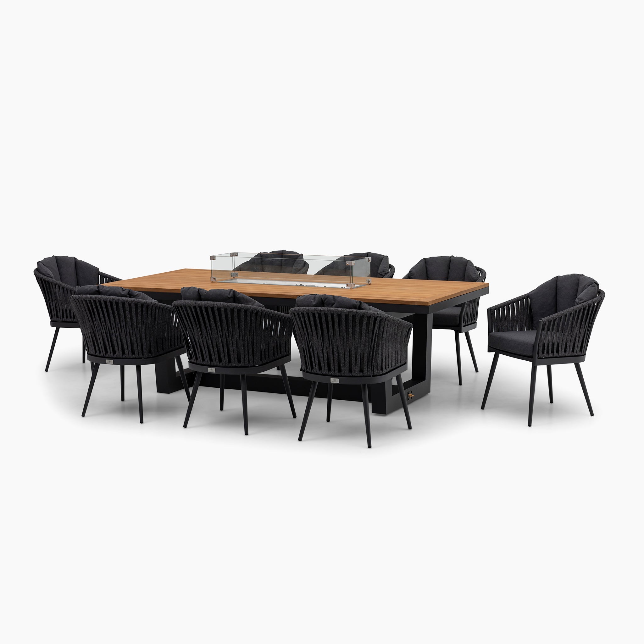 Modern *Monterrey 8 Seat Rope Rectangular Teak Firepit Dining Set in Grey* with a rectangular wooden table and eight black cushioned chairs against a white background.