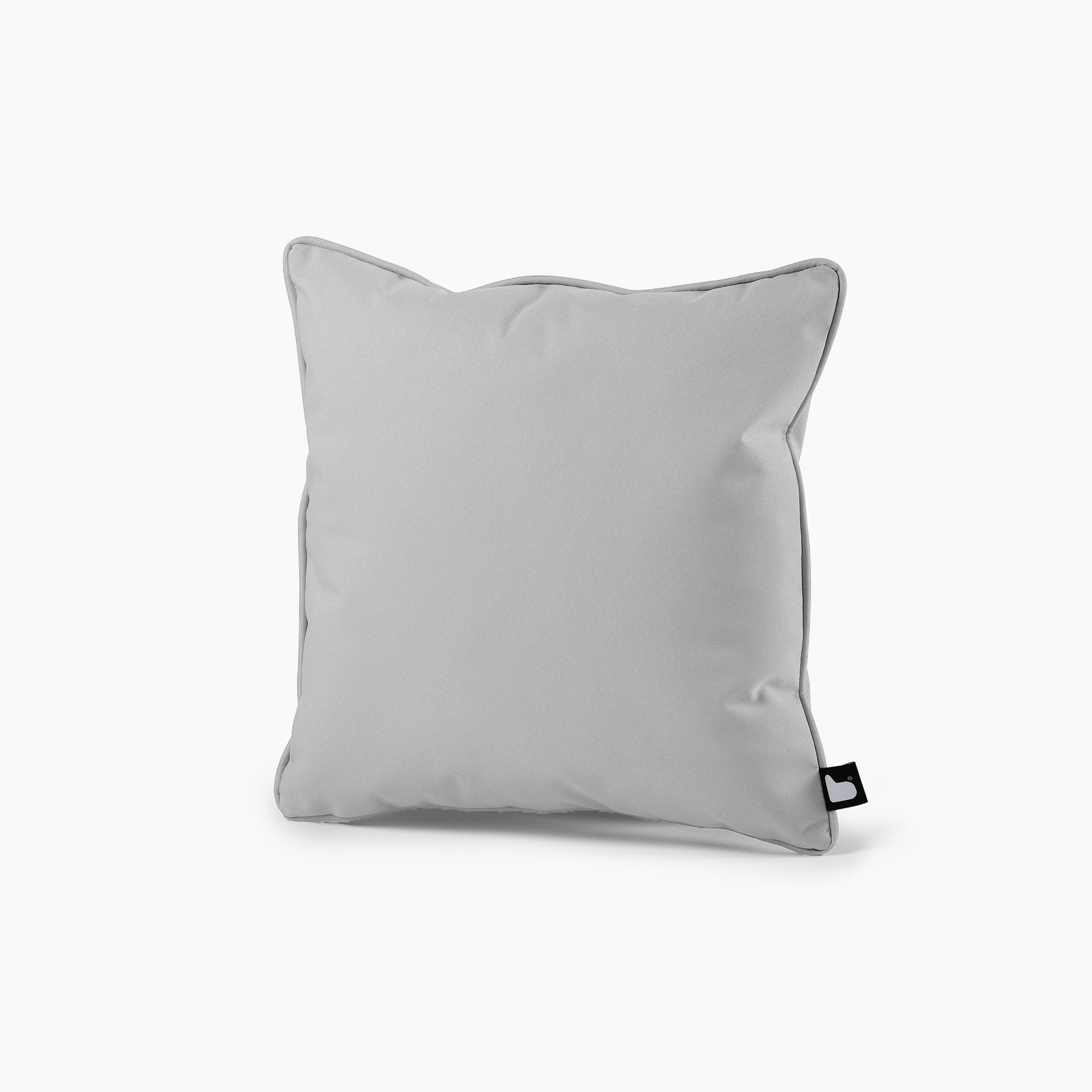 The Outdoor B-Cushion in Silver Grey, featuring a square shape and a small black tag on the lower right corner, stands out beautifully against a white background and is perfect for complementing your lounge furniture.