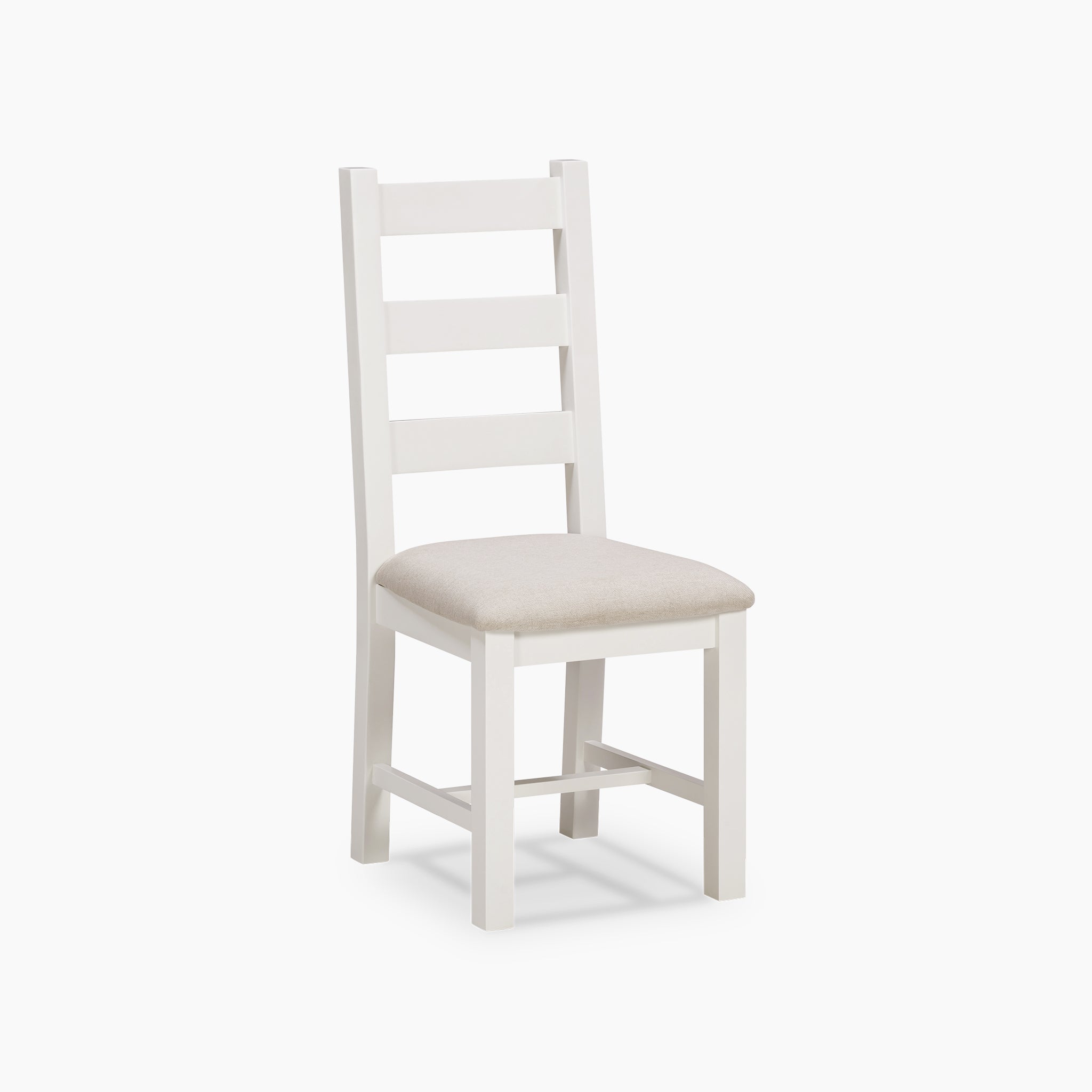 A white wooden chair with a beige cushioned seat sits elegantly on a white background, perfectly complementing the Warm White finish of the Burford 8 Seat Extending Dining Set.