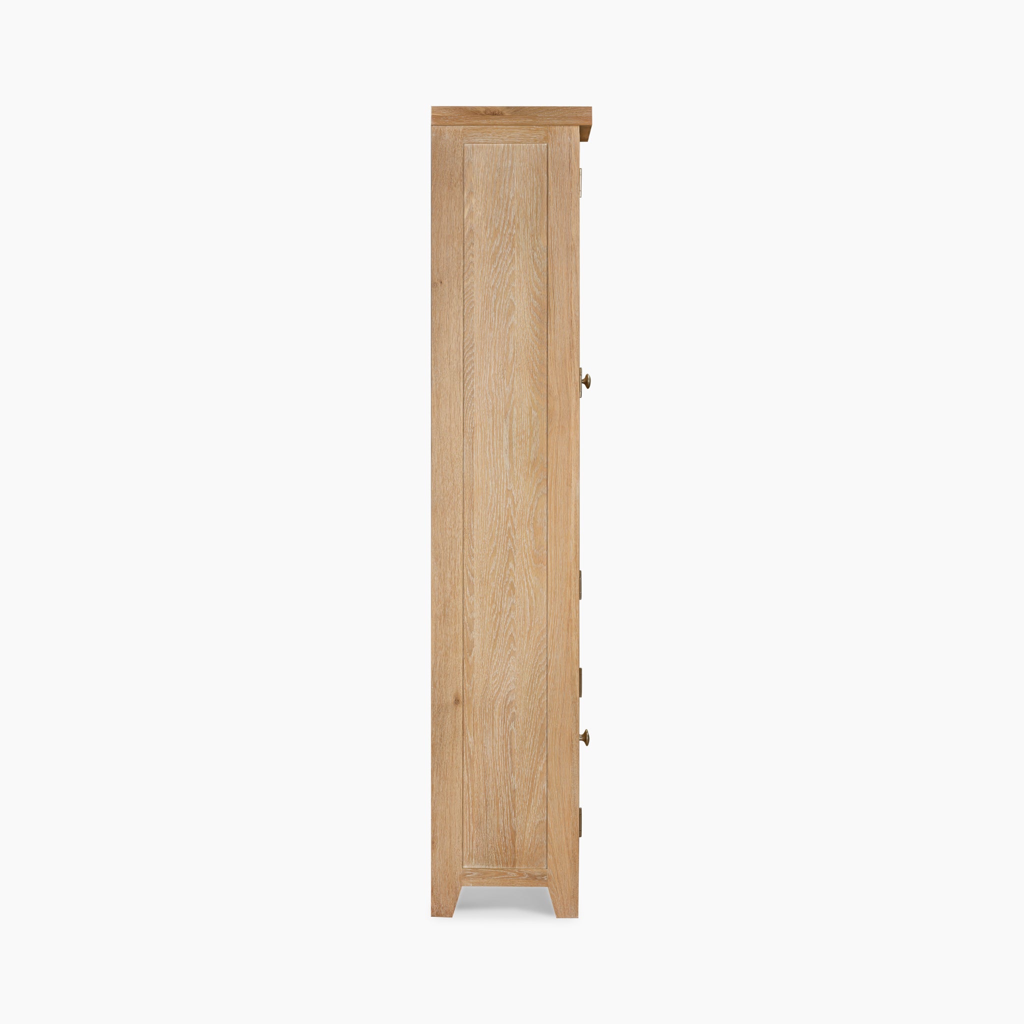 Side view of the Burford Display Cabinet in Natural Oak, featuring a tall wooden dresser with multiple drawers and elegant glass-panelled doors.