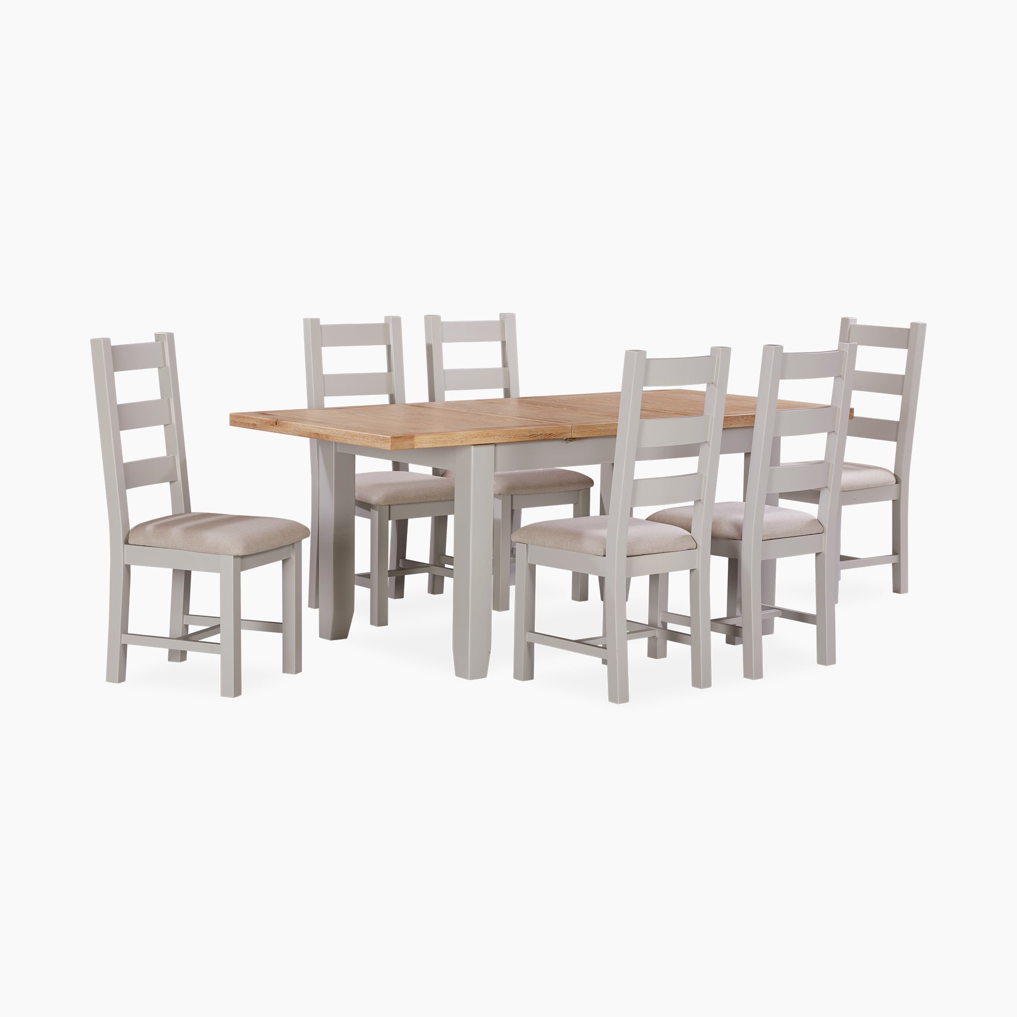 The Burford 6 Seat Extending Dining Set in Pebble Grey includes a wooden table and six ladder-back chairs with beige cushions, combining style and flexibility for any event.
